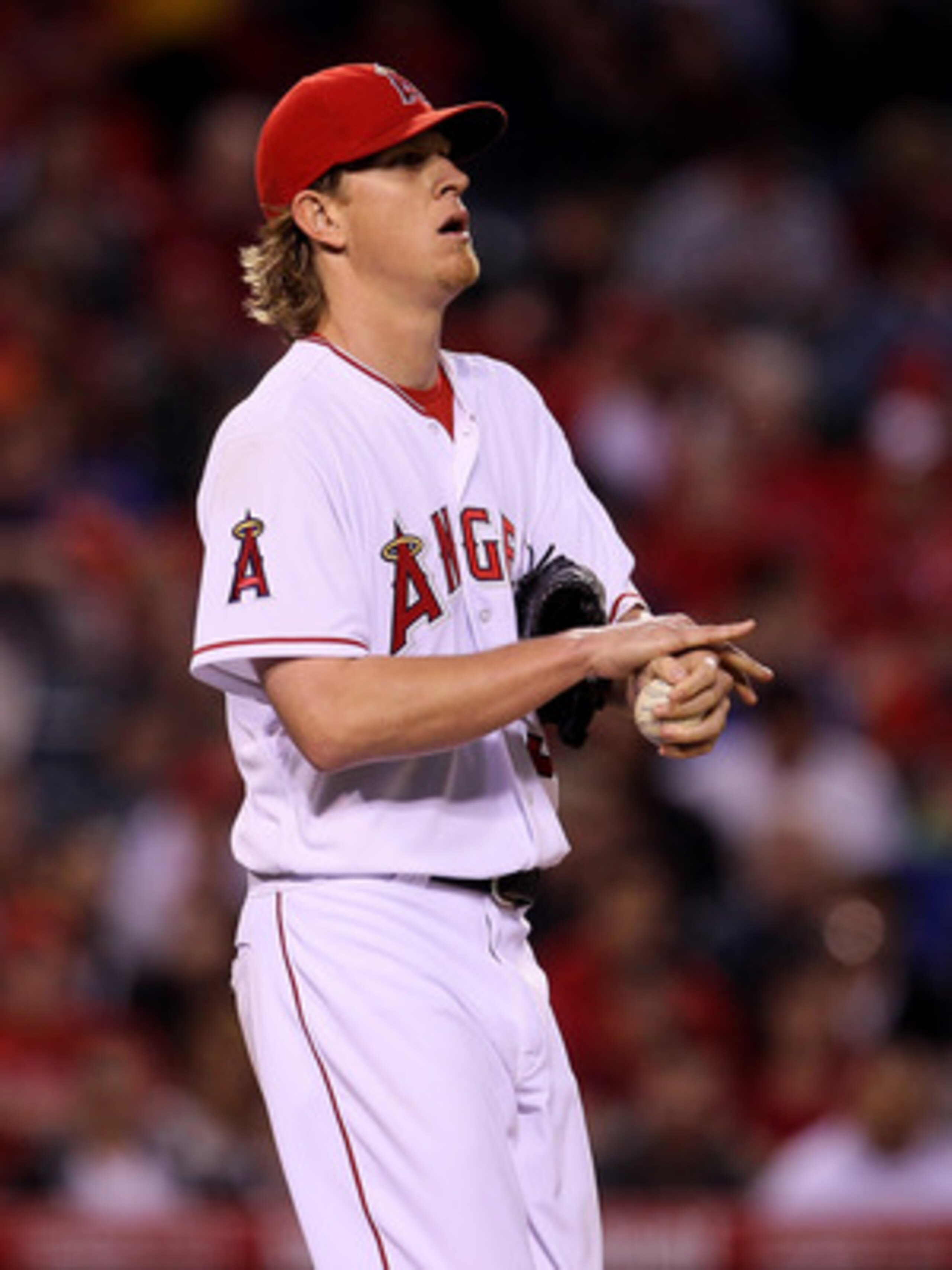ANAHEIM, CA - MAY 07:  Jered Weaver #36 of the Los Angeles Angels of Anaheim reacts after giving up a two RBI double to Shin-Soo Choo of the Cleveland Indians on May 7, 2011 at Angel Stadium in Anaheim, California.  (Photo by Stephen Dunn/Getty Images)