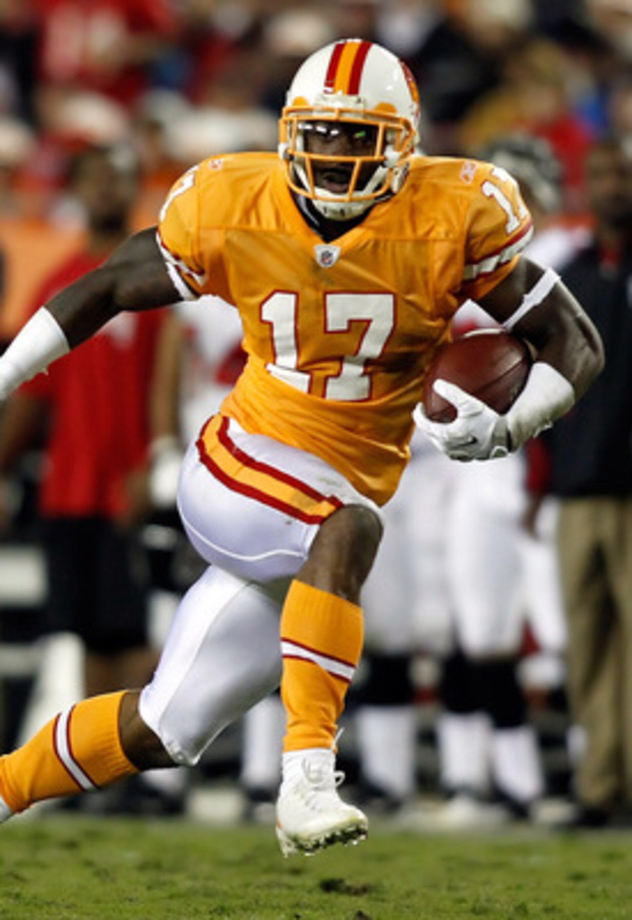 TAMPA, FL - DECEMBER 05:  Receiver Arrelious Benn #17 of the Tampa Bay Buccaneers runs after a catch against the Atlanta Falcons during the game at Raymond James Stadium on December 5, 2010 in Tampa, Florida.  (Photo by J. Meric/Getty Images)
