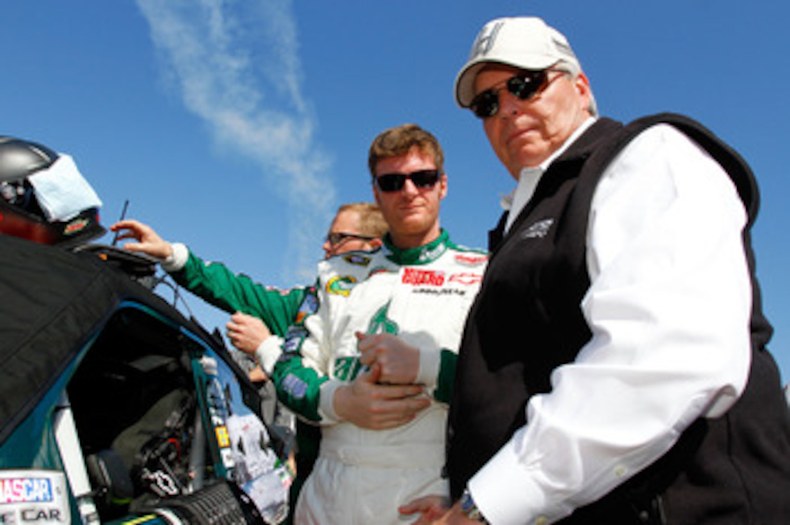 DAYTONA BEACH, FL - FEBRUARY 20:  Dale Earnhardt Jr., driver of the #88 National Guard/AMP Energy Chevrolet, speaks to team owner Rick Hendrick during the NASCAR Sprint Cup Series Daytona 500 at Daytona International Speedway on February 20, 2011 in Dayto