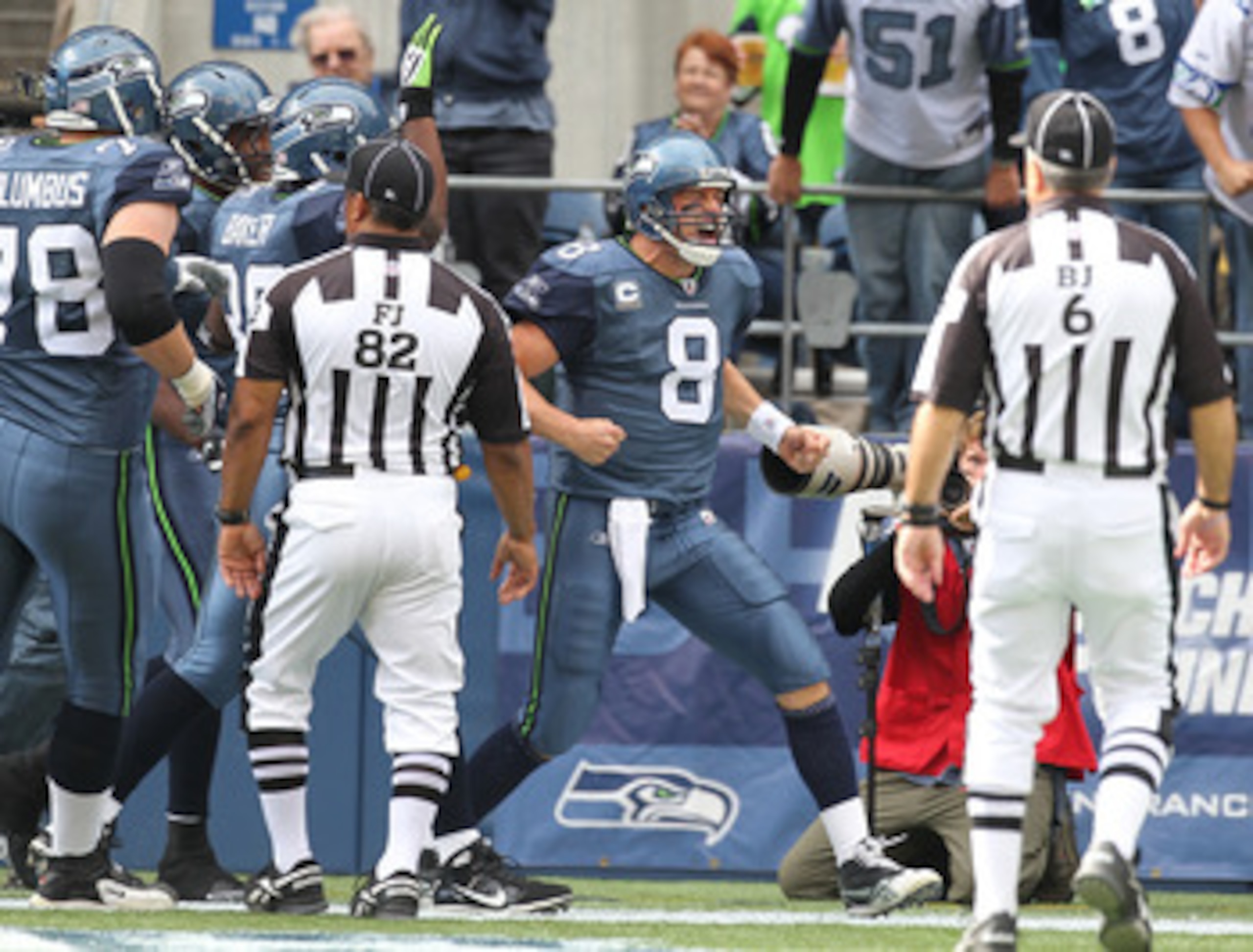 SEATTLE - SEPTEMBER 12:  Quarterback Matt Hasselbeck #8 of the Seattle Seahawks celebrates after scoring on a one yard touchdown run during the NFL season opener against the San Francisco 49ers at Qwest Field on September 12, 2010 in Seattle, Washington.