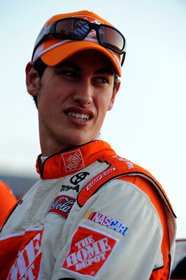 CHARLOTTE, NC - MAY 21:  Joey Logano, driver of the #20 The Home Depot Toyota, looks on prior to the NASCAR Sprint Showdown at Charlotte Motor Speedway on May 21, 2011 in Charlotte, North Carolina.  (Photo by Jared C. Tilton/Getty Images for NASCAR)