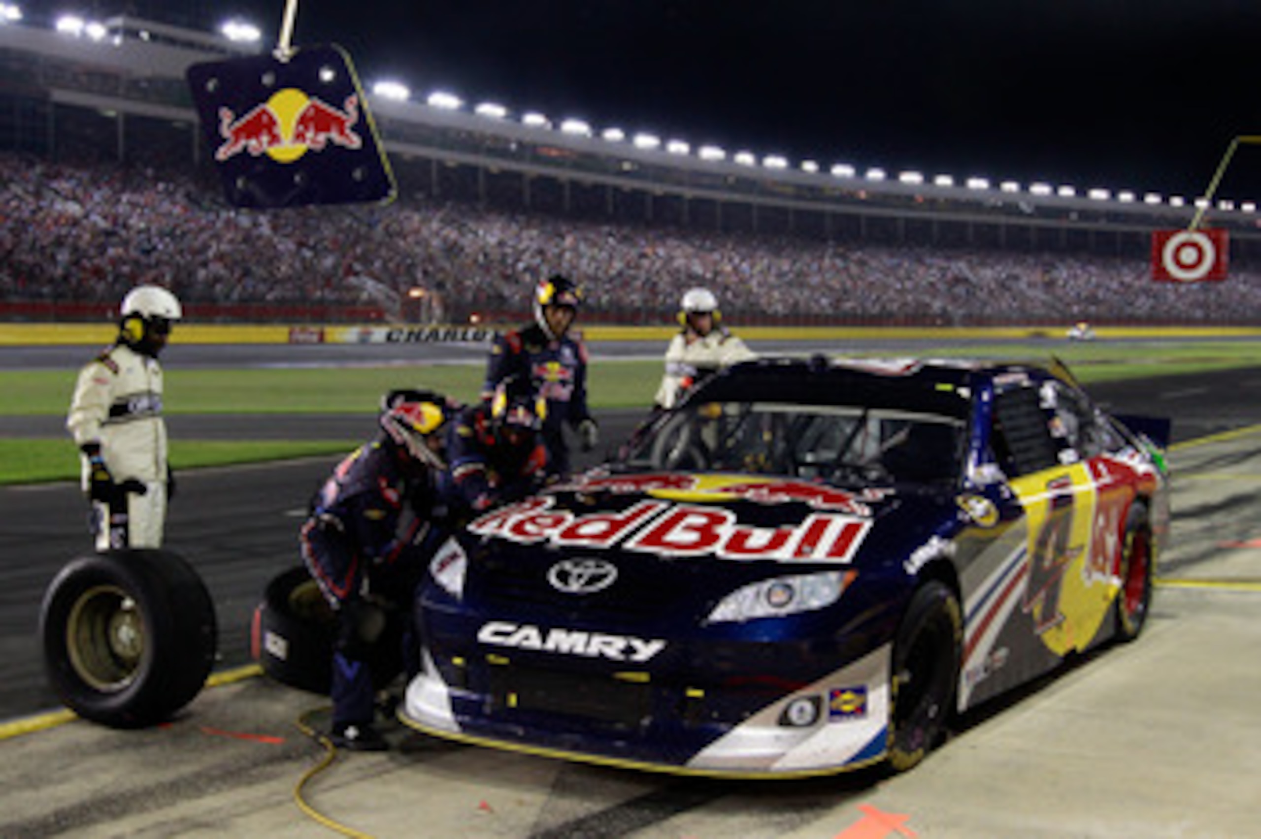 CHARLOTTE, NC - MAY 21:  Kasey Kahne, driver of the #4 Red Bull Toyota, makes a pit stop during the NASCAR Sprint All-Star Race at Charlotte Motor Speedway on May 21, 2011 in Charlotte, North Carolina.  (Photo by Chris Graythen/Getty Images)