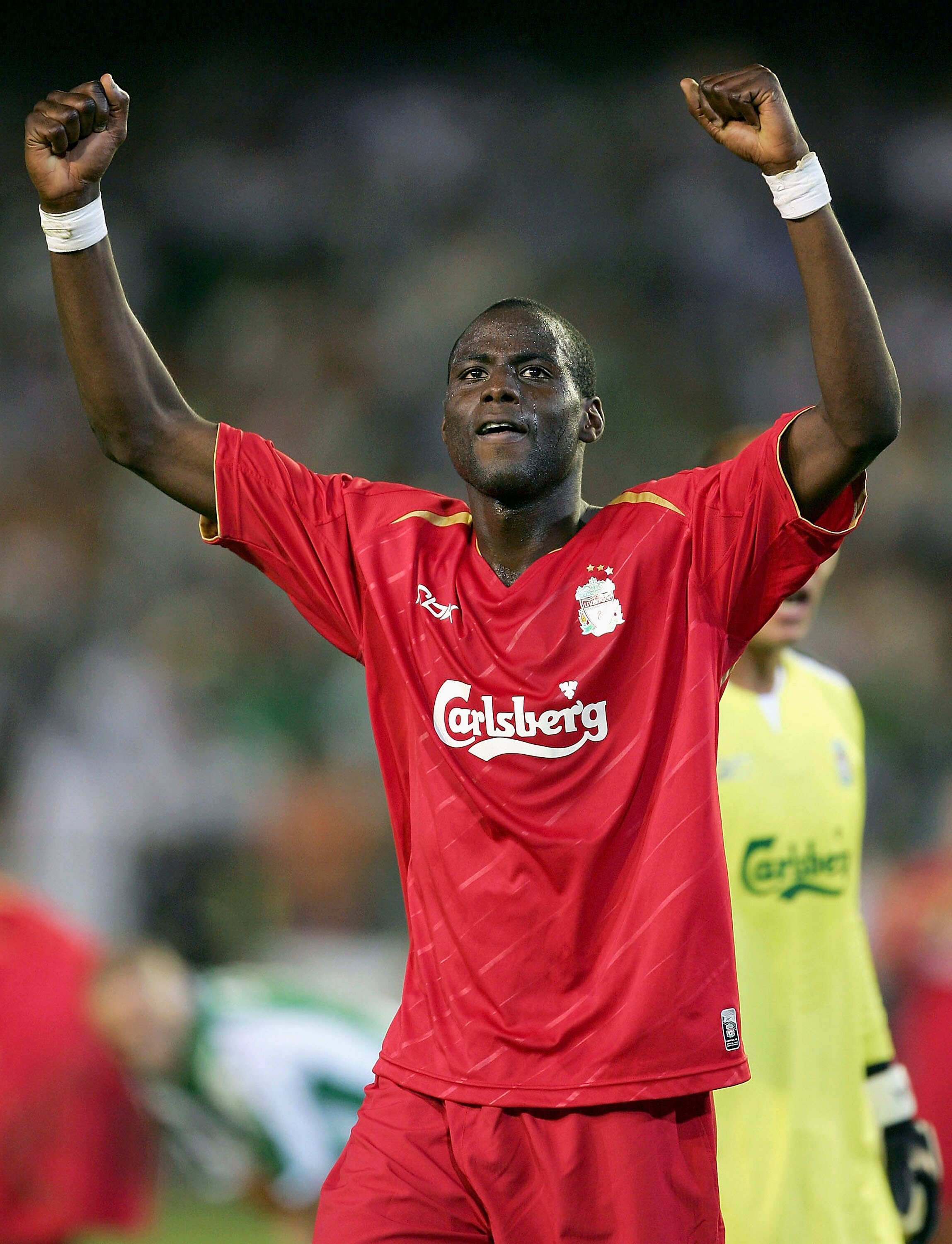 SEVILLE, SPAIN - SEPTEMBER 13: Djimi Traore of Liverpool celebrates after Liverpool's 2-1 victory in the UEFA Champions League Group G match between Real Betis and Liverpool at the Estadio Ruiz de Lopera on September 13, 2005 in Seville, Spain. (Photo SEVILLE, SPAIN - SEPTEMBER 13: Djimi Traore of Liverpool celebrates after Liverpool's 2-1 victory in the UEFA Champions League Group G match between Real Betis and Liverpool at the Estadio Ruiz de Lopera on September 13, 2005 in Seville, Spain. (Photo