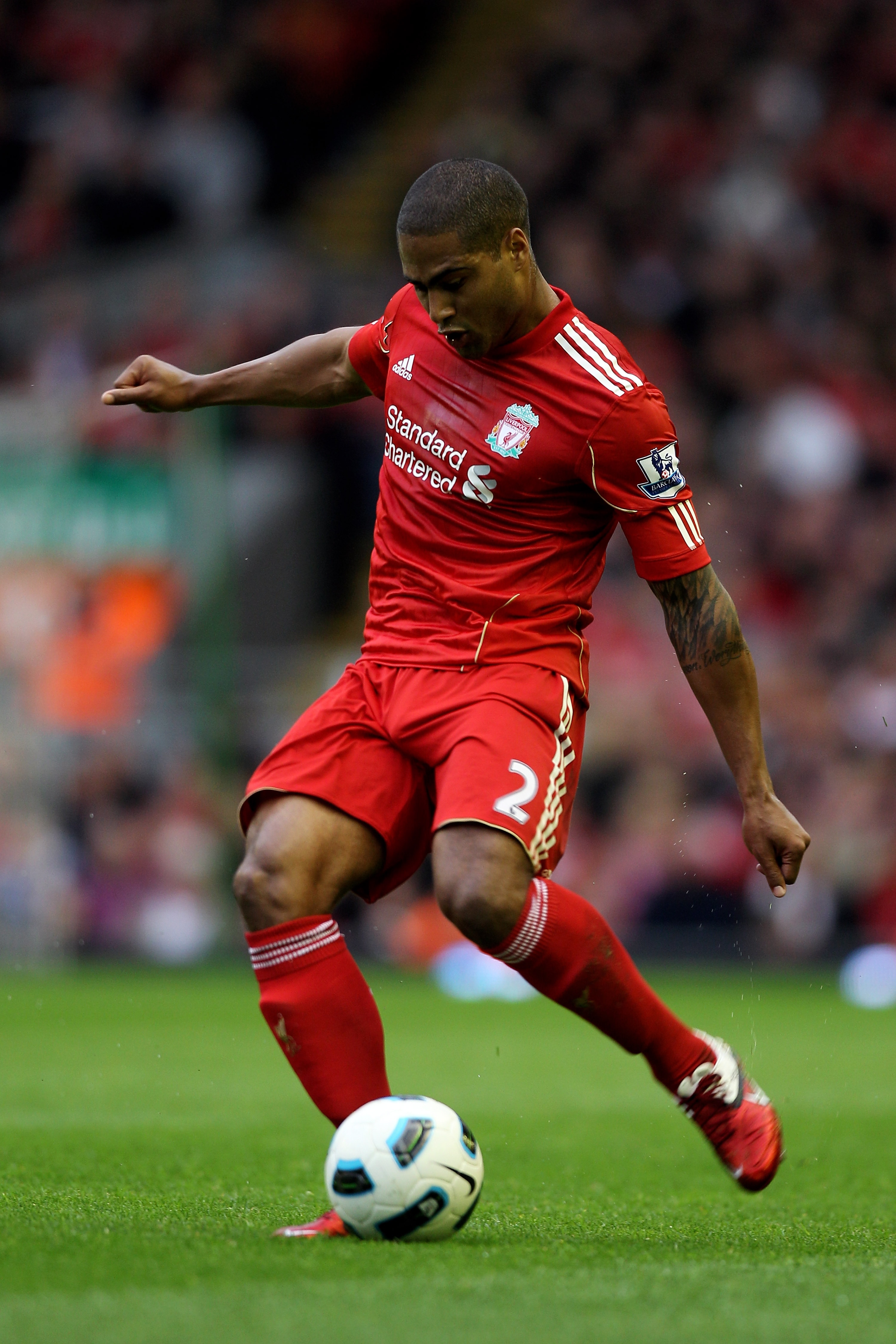 LIVERPOOL, ENGLAND - MAY 15: Glen Johnson of Liverpool crosses the ball during the Barclays Premier League match between Liverpool and Tottenham Hotspur at Anfield on May 15, 2011 in Liverpool, England. (Photo by Michael Steele/Getty Images) LIVERPOOL, ENGLAND - MAY 15: Glen Johnson of Liverpool crosses the ball during the Barclays Premier League match between Liverpool and Tottenham Hotspur at Anfield on May 15, 2011 in Liverpool, England. (Photo by Michael Steele/Getty Images)