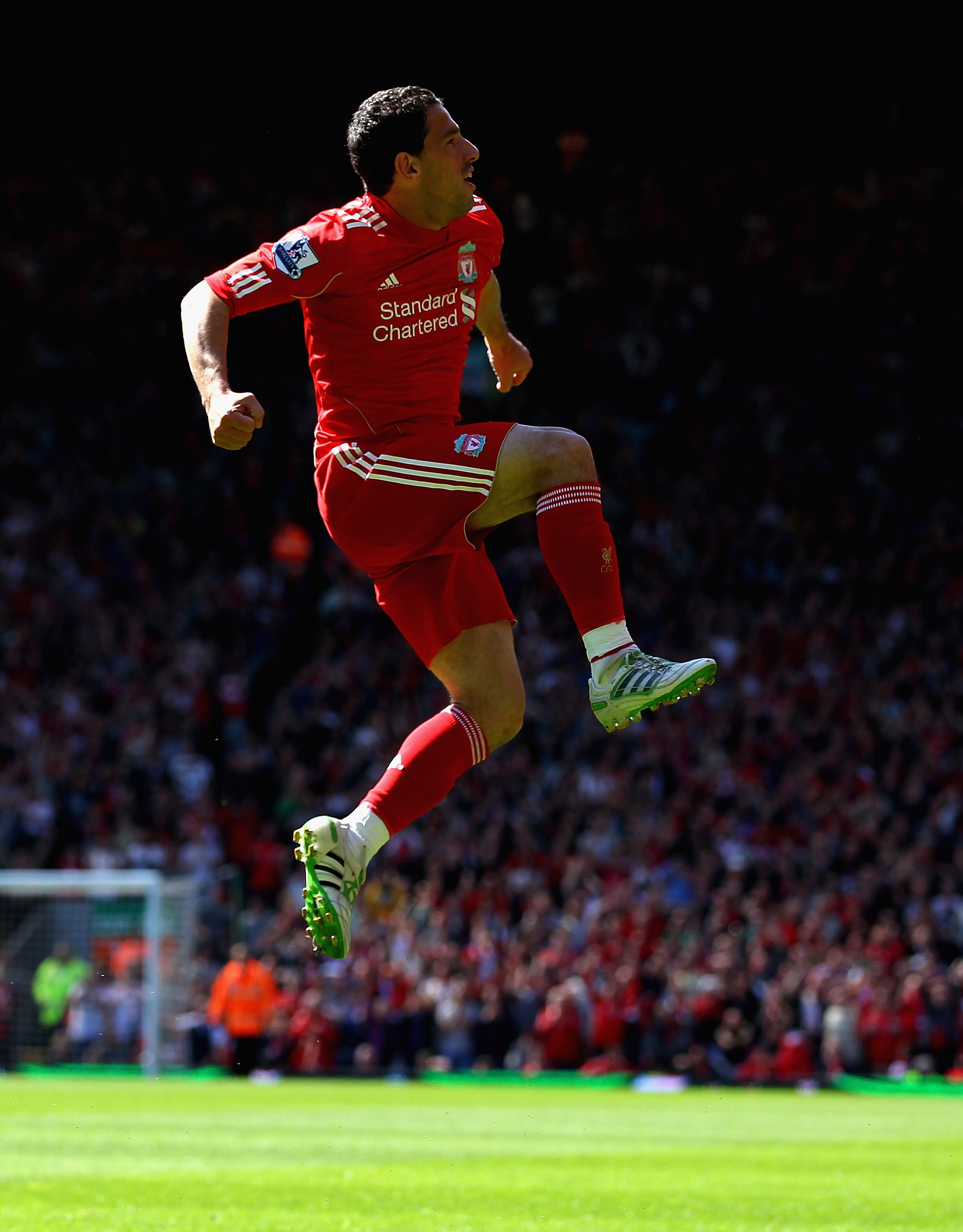 LIVERPOOL, ENGLAND - MAY 01: Maxi Rodriguez of Liverpool leaps into the air to celebrate after scoring the first goal during the Barclays Premier League match between Liverpool and Newcastle United at Anfield on May 1, 2011 in Liverpool, England. (Phot LIVERPOOL, ENGLAND - MAY 01: Maxi Rodriguez of Liverpool leaps into the air to celebrate after scoring the first goal during the Barclays Premier League match between Liverpool and Newcastle United at Anfield on May 1, 2011 in Liverpool, England. (Phot