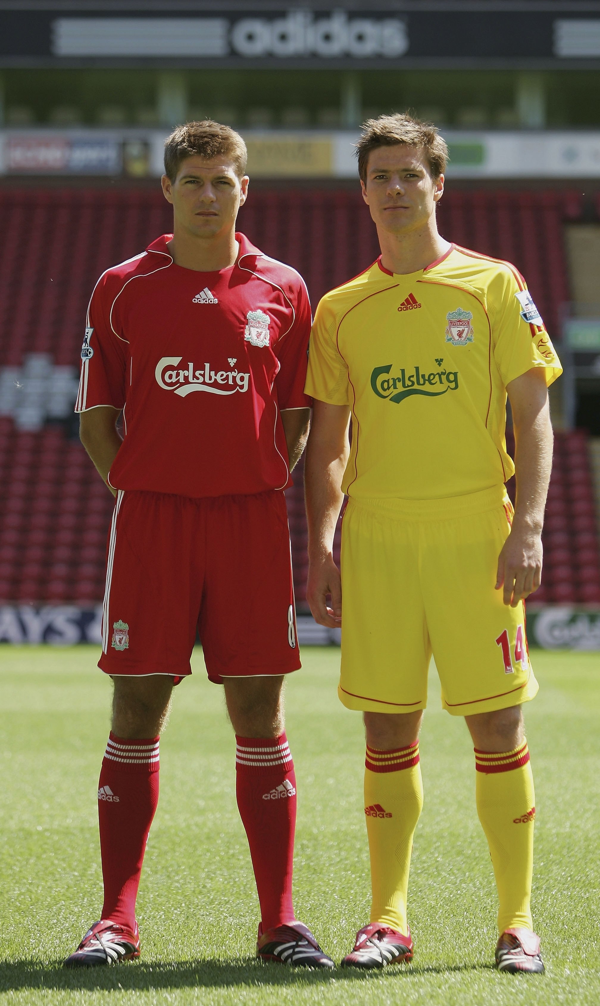 LIVERPOOL, UNITED KINGDOM - JULY 24: Liverpool captain Steven Gerrard (L) and Xabi Alonso show off the new home and away kits during the Liverpool FC Adidas Kit Launch at Anfield on July 24, 2006 in Liverpool, England. (Photo by Ian Walton/Getty Images LIVERPOOL, UNITED KINGDOM - JULY 24: Liverpool captain Steven Gerrard (L) and Xabi Alonso show off the new home and away kits during the Liverpool FC Adidas Kit Launch at Anfield on July 24, 2006 in Liverpool, England. (Photo by Ian Walton/Getty Images