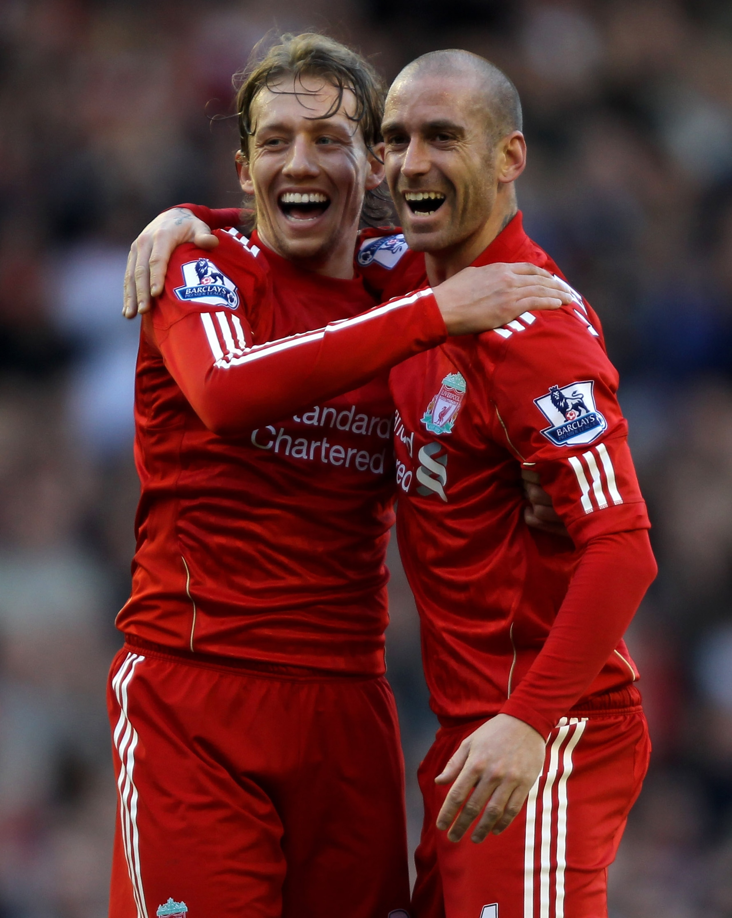 LIVERPOOL, ENGLAND - FEBRUARY 12: Raul Meireles (R) of Liverpool celebrates scoring the opening goal with team mate Lucas during the Barclays Premier League match between Liverpool and Wigan Athletic at Anfield on February 12, 2011 in Liverpool, England. LIVERPOOL, ENGLAND - FEBRUARY 12: Raul Meireles (R) of Liverpool celebrates scoring the opening goal with team mate Lucas during the Barclays Premier League match between Liverpool and Wigan Athletic at Anfield on February 12, 2011 in Liverpool, England.