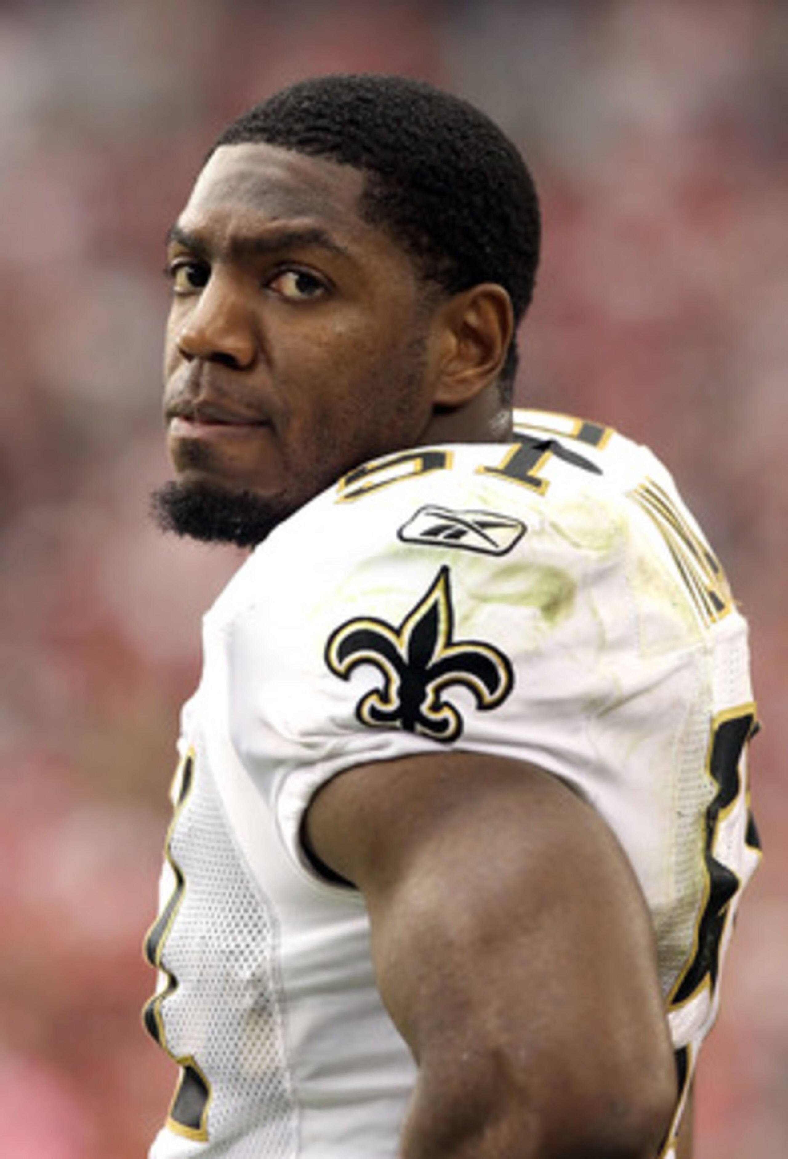GLENDALE, AZ - OCTOBER 10:  Linebacker Jonathan Vilma #51 of the New Orleans Saints stands on the sidelines during the NFL game against the Arizona Cardinals at the University of Phoenix Stadium on October 10, 2010 in Glendale, Arizona. The Cardinals defe