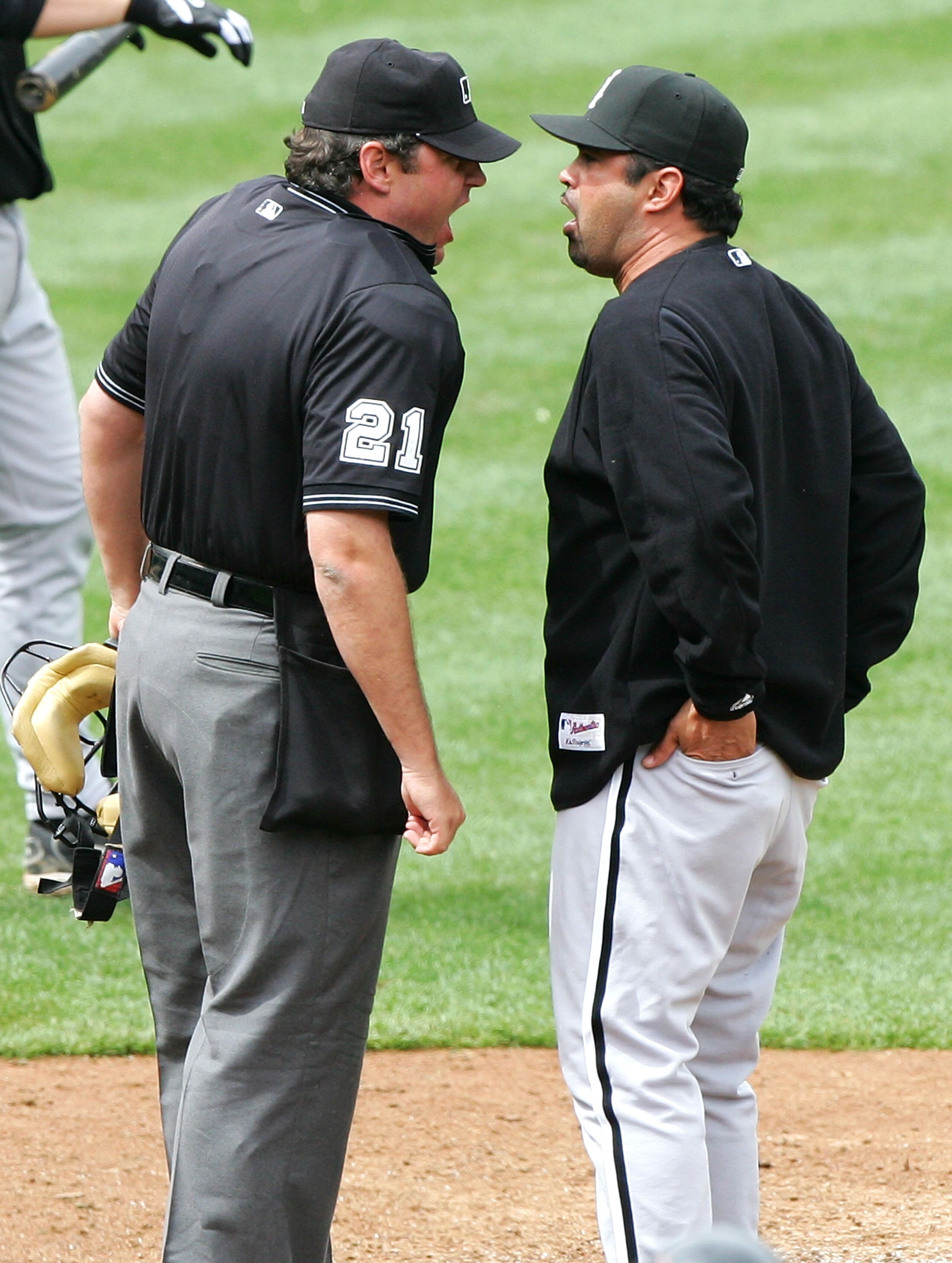 OAKLAND, CA - APRIL 27: Umpire Hunter Wendelstedt #21 (L) and Ozzie Guillen #13, manager of the Chicago White Sox, argue during the game between the Sox and the Oakland Athletics on April 27, 2005 at McAfee Coliseum in Oakland, California. (Photo by Jed OAKLAND, CA - APRIL 27: Umpire Hunter Wendelstedt #21 (L) and Ozzie Guillen #13, manager of the Chicago White Sox, argue during the game between the Sox and the Oakland Athletics on April 27, 2005 at McAfee Coliseum in Oakland, California. (Photo by Jed