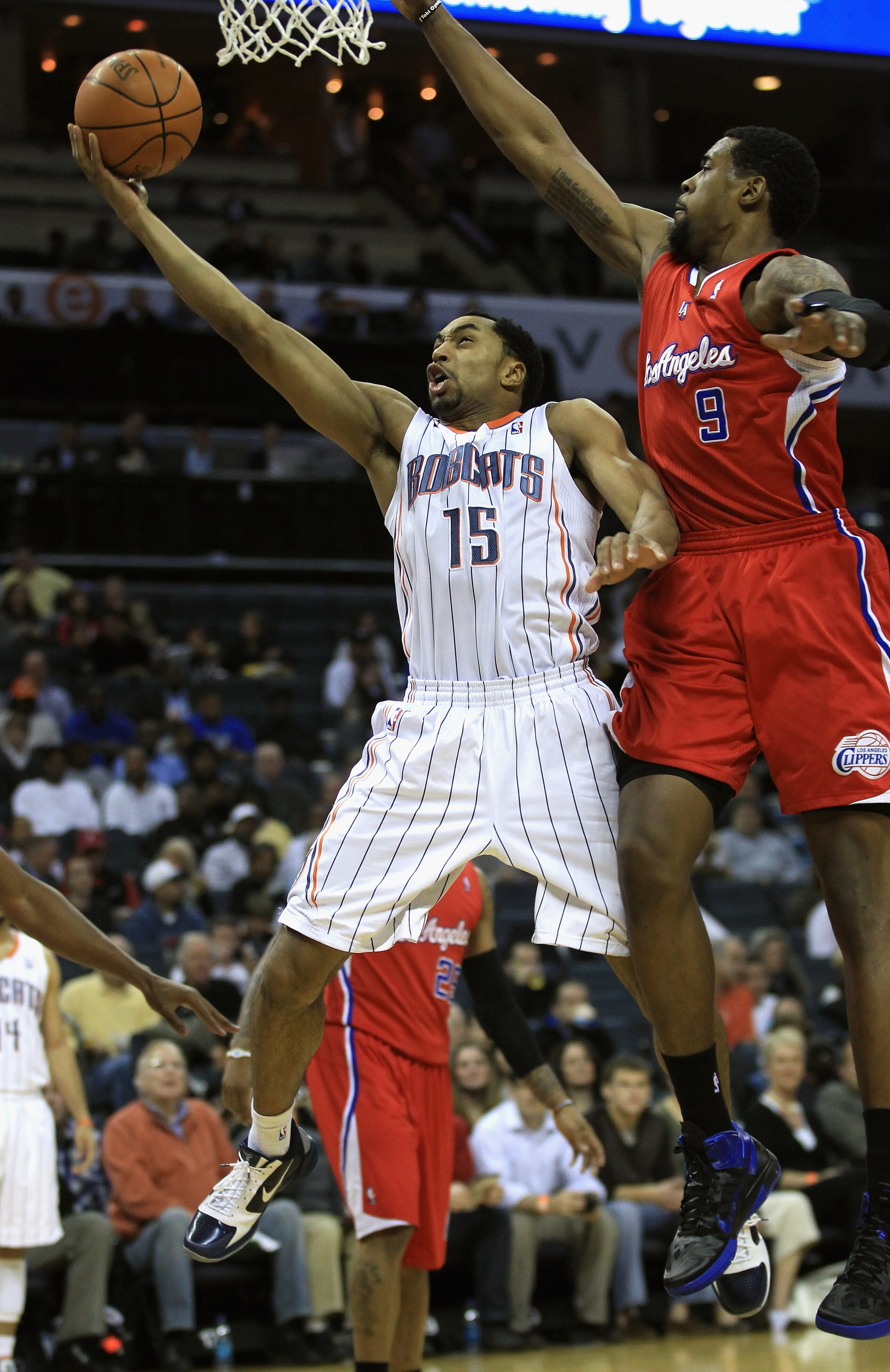 CHARLOTTE, NC - MARCH 07:  DeAndre Jordan #9 of the Los Angeles Clippers tries to block Gerald Henderson #15 of the Charlotte Bobcats during their game at Time Warner Cable Arena on March 7, 2011 in Charlotte, North Carolina. NOTE TO USER: User expressly
