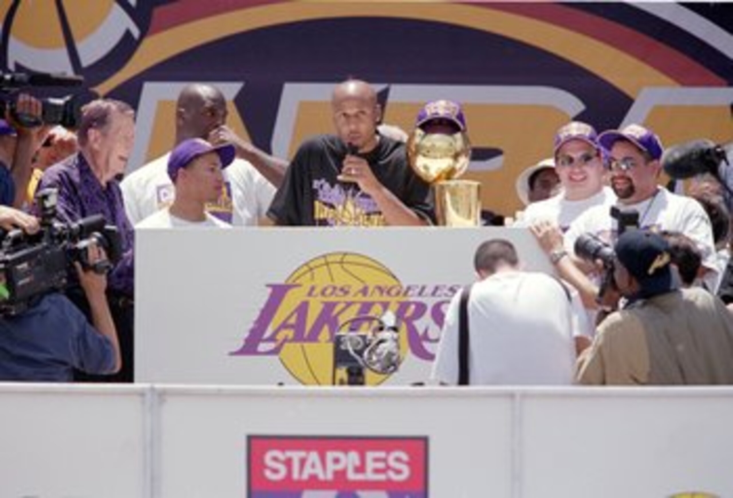 21 Jun 2000:  Brian Shaw #20 of the Los Angeles Lakers answers questions during the Lakers Victory Parade in Los Angeles, California.  NOTE TO USER: It is expressly understood that the only rights Allsport are offering to license in this Photograph are on