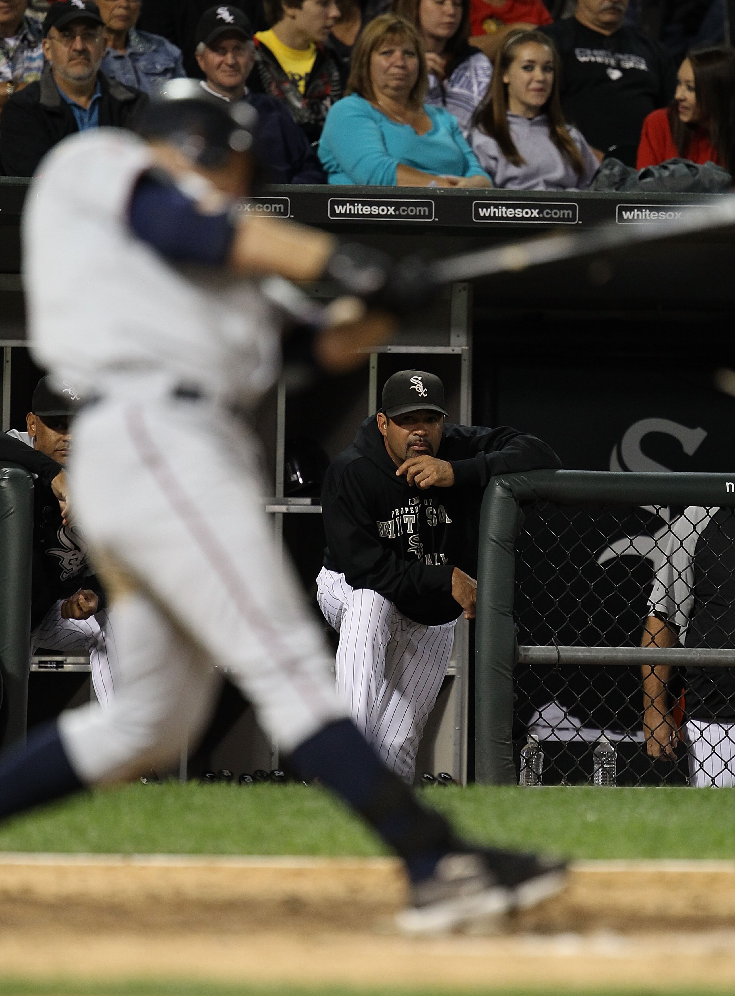 CHICAGO - SEPTEMBER 14: Manager Ozzie Guillen #13 of the Chicago White Sox watches as Jim Thome #25 of the Minnesota Twins takes a swing at U.S. Cellular Field on September 14, 2010 in Chicago, Illinois. (Photo by Jonathan Daniel/Getty Images) CHICAGO - SEPTEMBER 14: Manager Ozzie Guillen #13 of the Chicago White Sox watches as Jim Thome #25 of the Minnesota Twins takes a swing at U.S. Cellular Field on September 14, 2010 in Chicago, Illinois. (Photo by Jonathan Daniel/Getty Images)