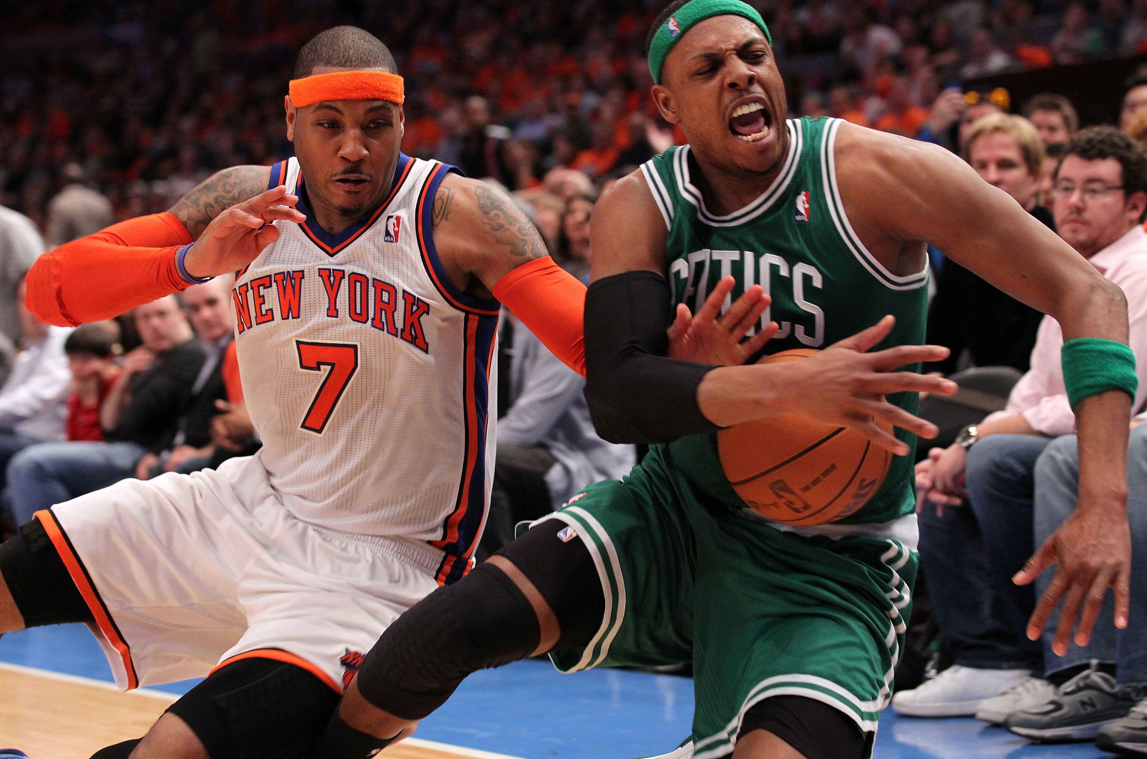NEW YORK, NY - APRIL 24:  Carmelo Anthony #7 of the New York Knicks and Paul Pierce #34 of the Boston Celtics fight for control of a loose ball in the second half of Game Four of the Eastern Conference Quarterfinals during the 2011 NBA Playoffs on April 2