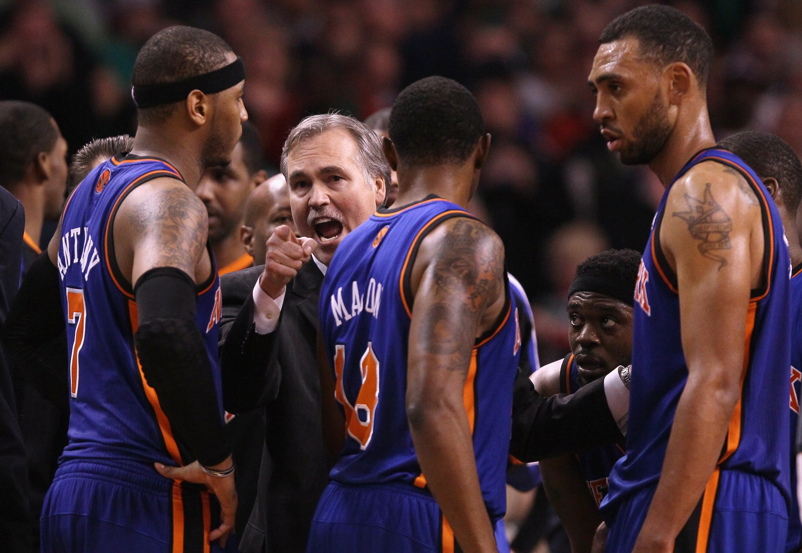 BOSTON, MA - APRIL 19:  Mike D'Antoni of the New York Knicks talks with his players during a time out in the final seconds of the game against the Boston Celtics in Game Two of the Eastern Conference Quarterfinals in the 2011 NBA Playoffs on April 19, 201