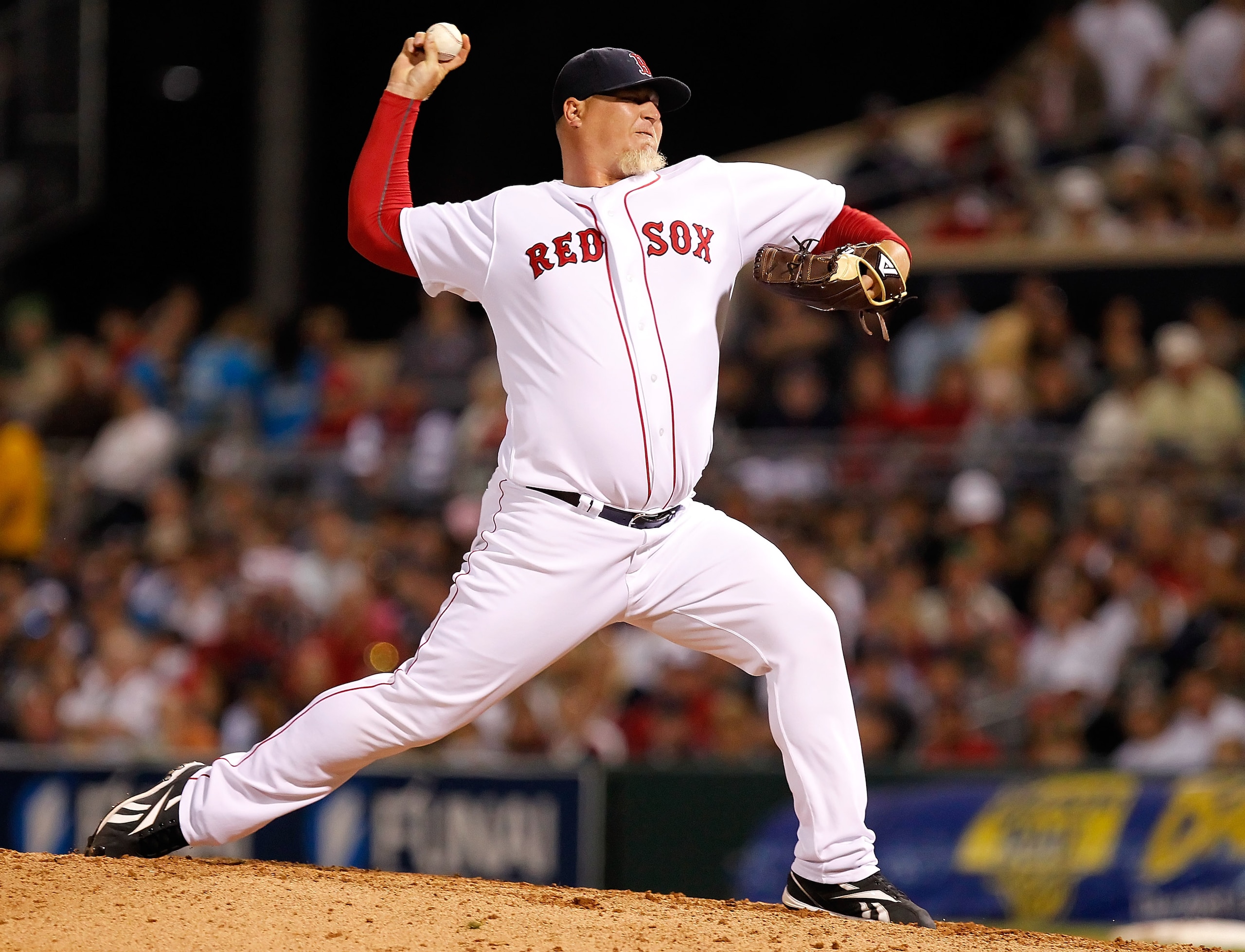FORT MYERS, FL - MARCH 14:  Pitcher Bobby Jenks #52 of the Boston Red Sox pitches against the New York Yankees during a Grapefruit League Spring Training Game at City of Palms Park on March 14, 2011 in Fort Myers, Florida.  (Photo by J. Meric/Getty Images