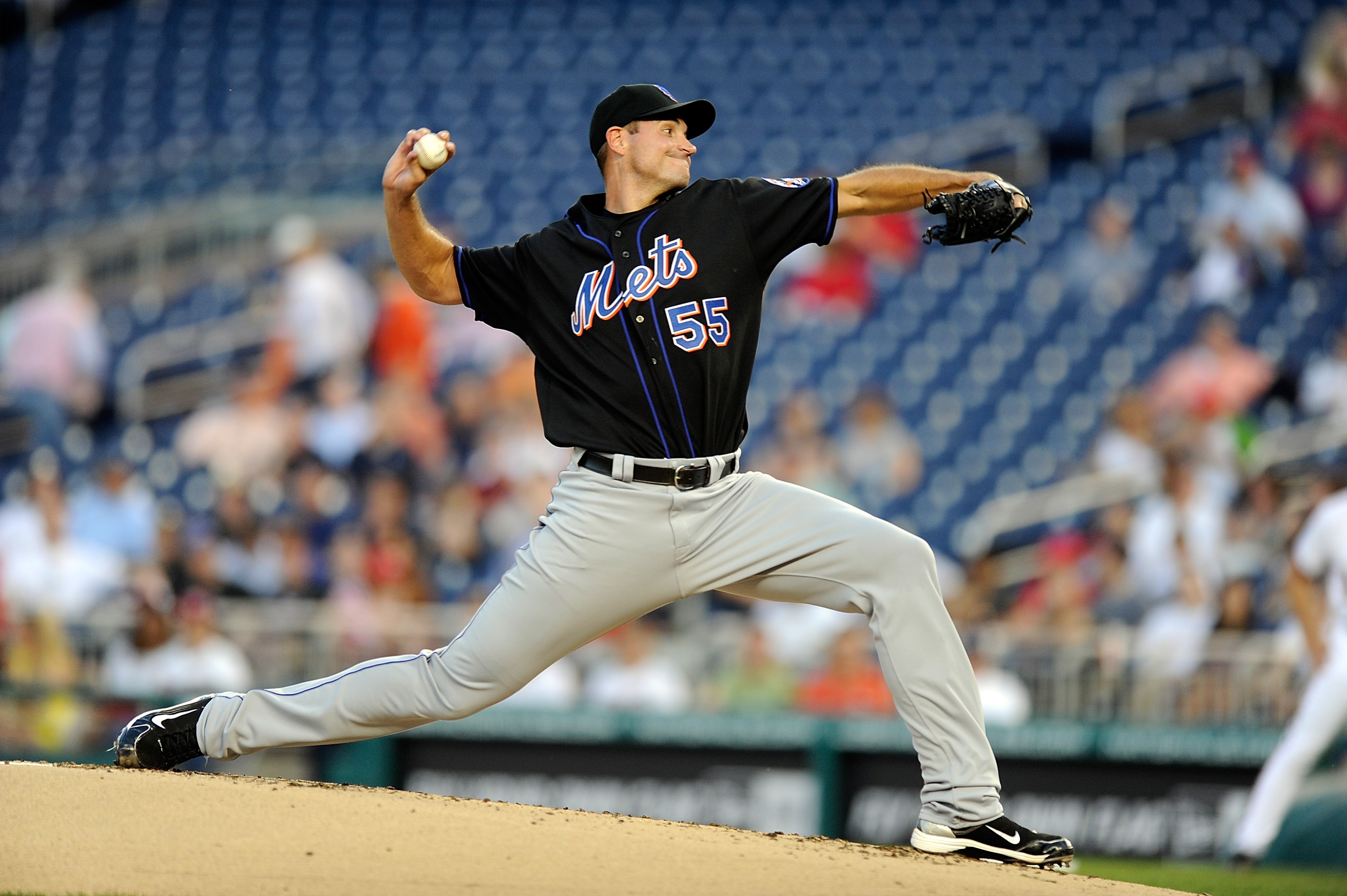 WASHINGTON, DC - APRIL 26:  Chris Young #55 of the New York Mets pitches against the Washington Nationals at Nationals Park on April 26, 2011 in Washington, DC.  (Photo by Greg Fiume/Getty Images)