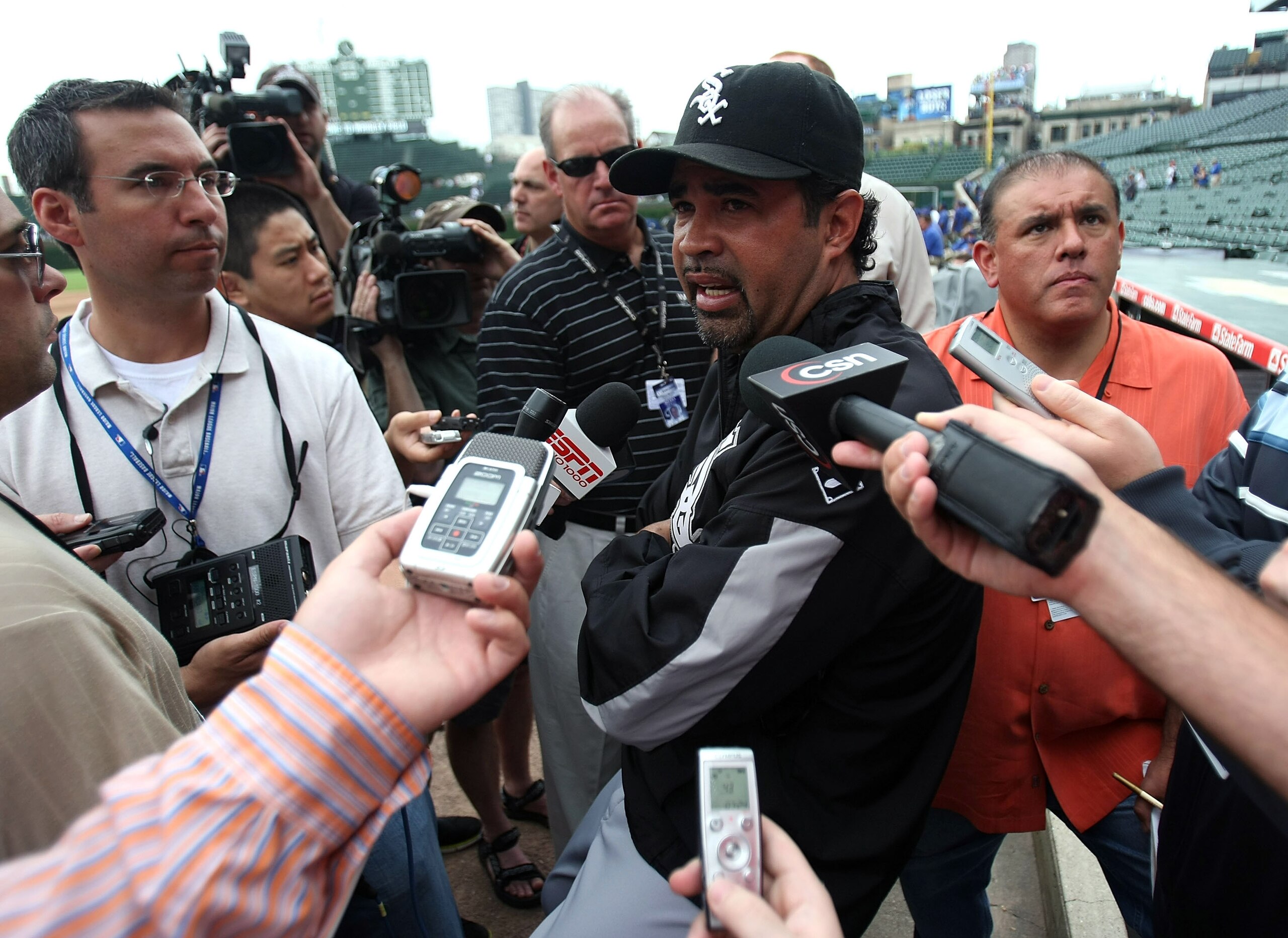 CHICAGO - JUNE 20: Manager Ozzie Guillen #13 of the Chicago White Sox talks to media members before a game against the Chicago Cubs on June 20, 2008 at Wrigley Field in Chicago, Illinois. (Photo by Jonathan Daniel/Getty Images) CHICAGO - JUNE 20: Manager Ozzie Guillen #13 of the Chicago White Sox talks to media members before a game against the Chicago Cubs on June 20, 2008 at Wrigley Field in Chicago, Illinois. (Photo by Jonathan Daniel/Getty Images)