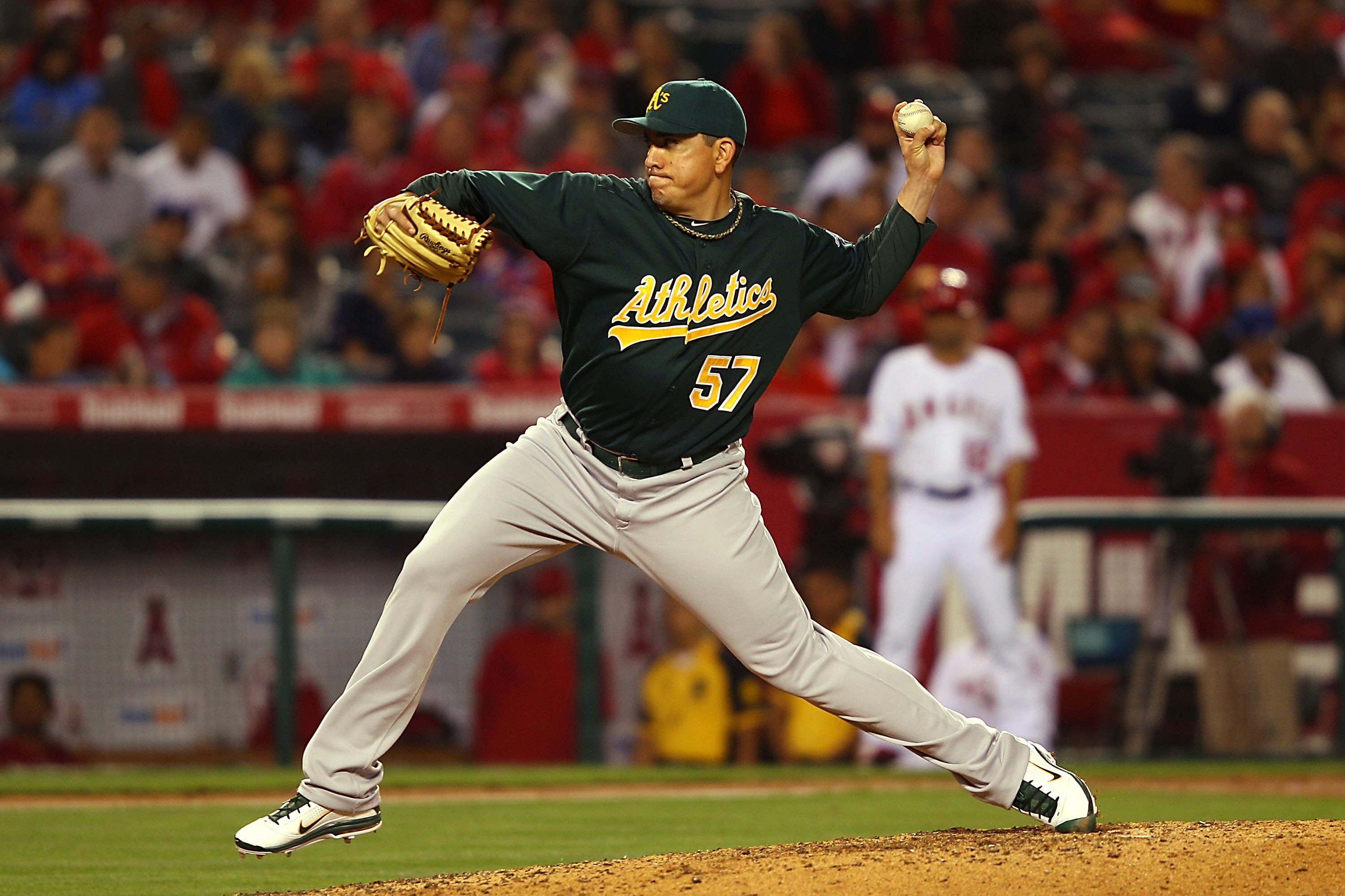 ANAHEIM, CA - MAY 23:  Brian Fuentes #57 of the Oakland Athletics pitches against the Los Angeles Angeles of Anaheim in the eighth inning at Angel Stadium on May 23, 2011 in Anaheim, California.  (Photo by Joe Scarnici/Getty Images)