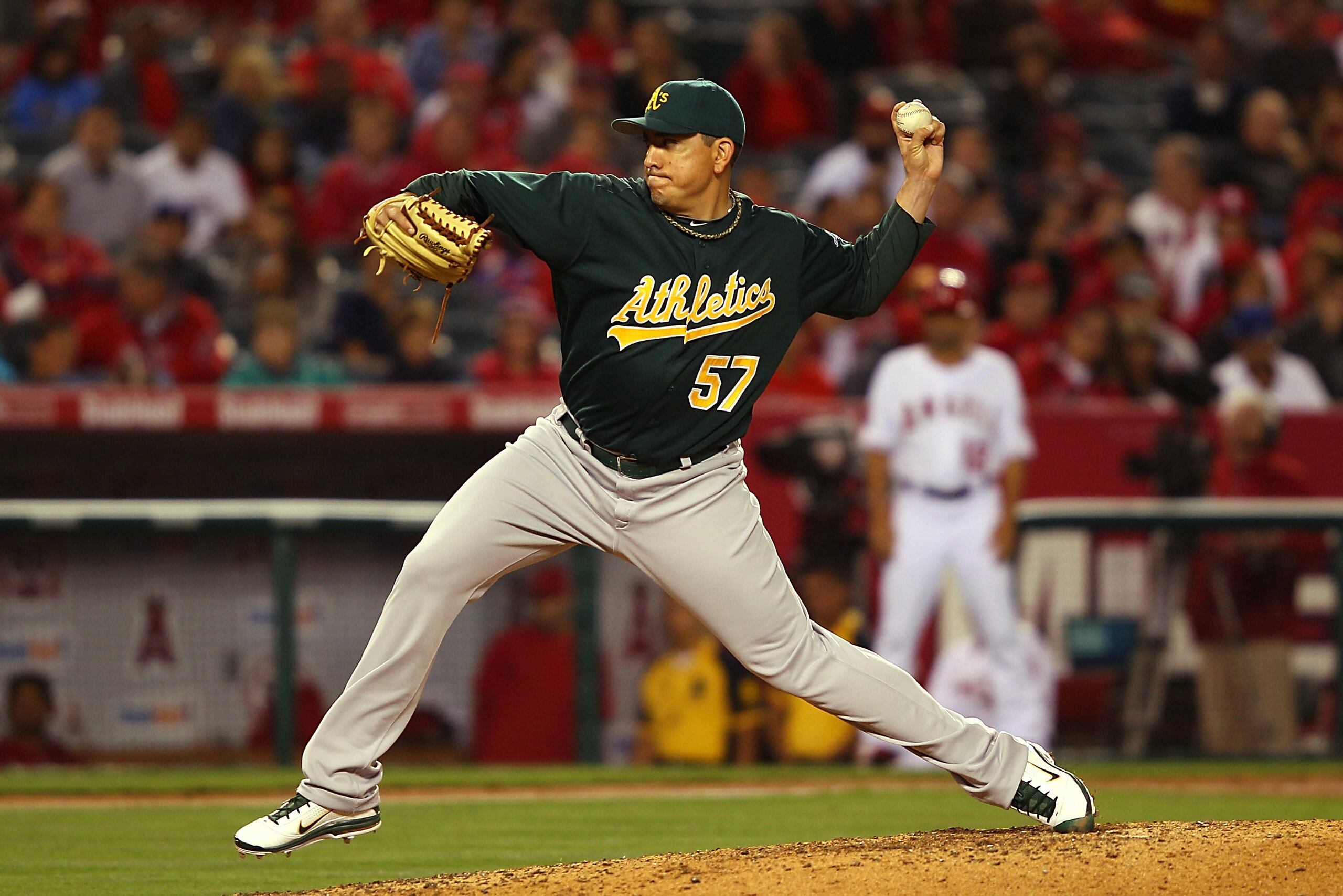 ANAHEIM, CA - MAY 23:  Brian Fuentes #57 of the Oakland Athletics pitches against the Los Angeles Angeles of Anaheim in the eighth inning at Angel Stadium on May 23, 2011 in Anaheim, California.  (Photo by Joe Scarnici/Getty Images)