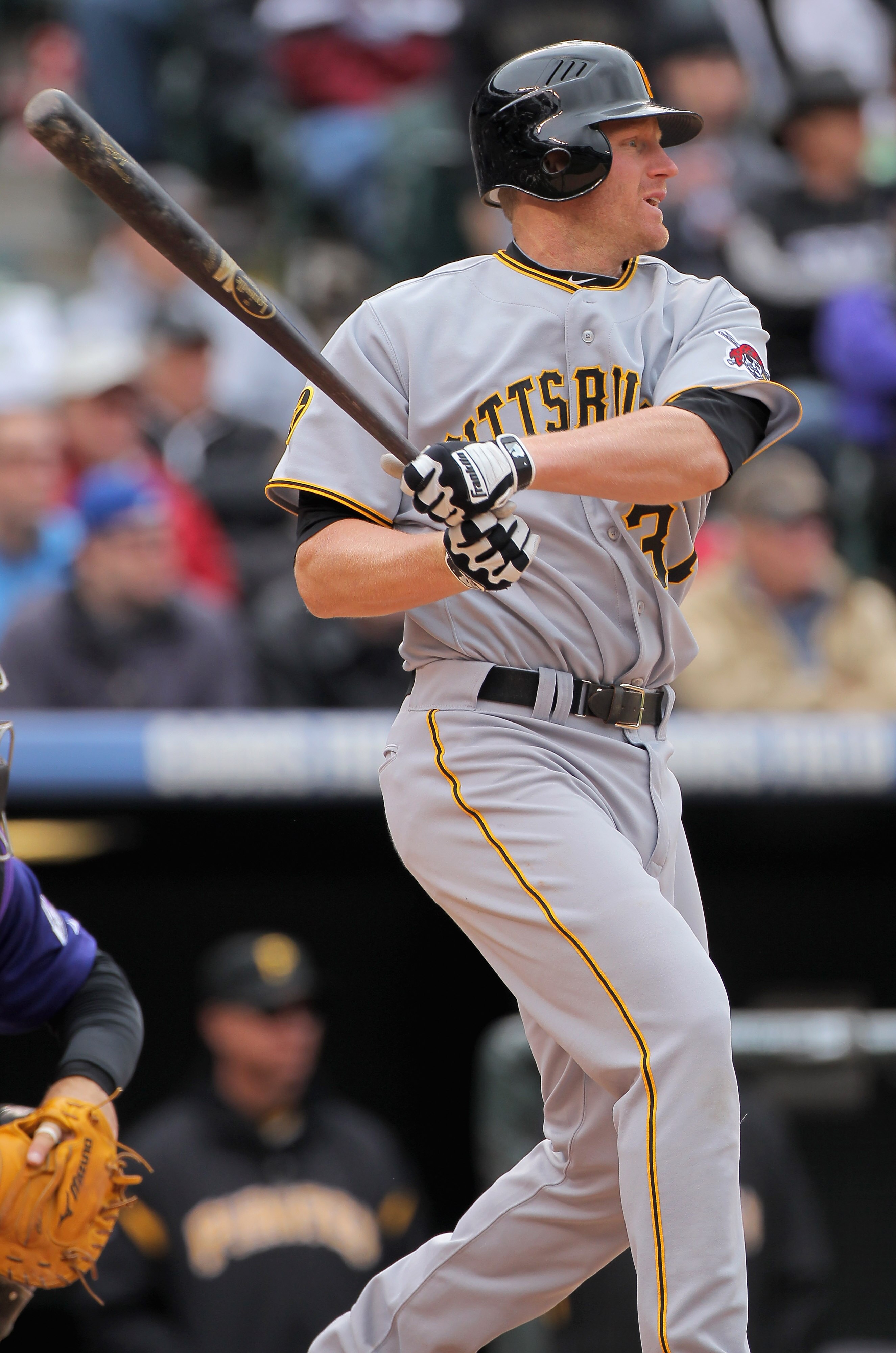 DENVER, CO - MAY 01:  First baseman Lyle Overbay #37 of the Pittsburgh Pirates takes an at bat against the Colorado Rockies at Coors Field on May 1, 2011 in Denver, Colorado. The Pirates defeated the Rockies 8-4.  (Photo by Doug Pensinger/Getty Images)