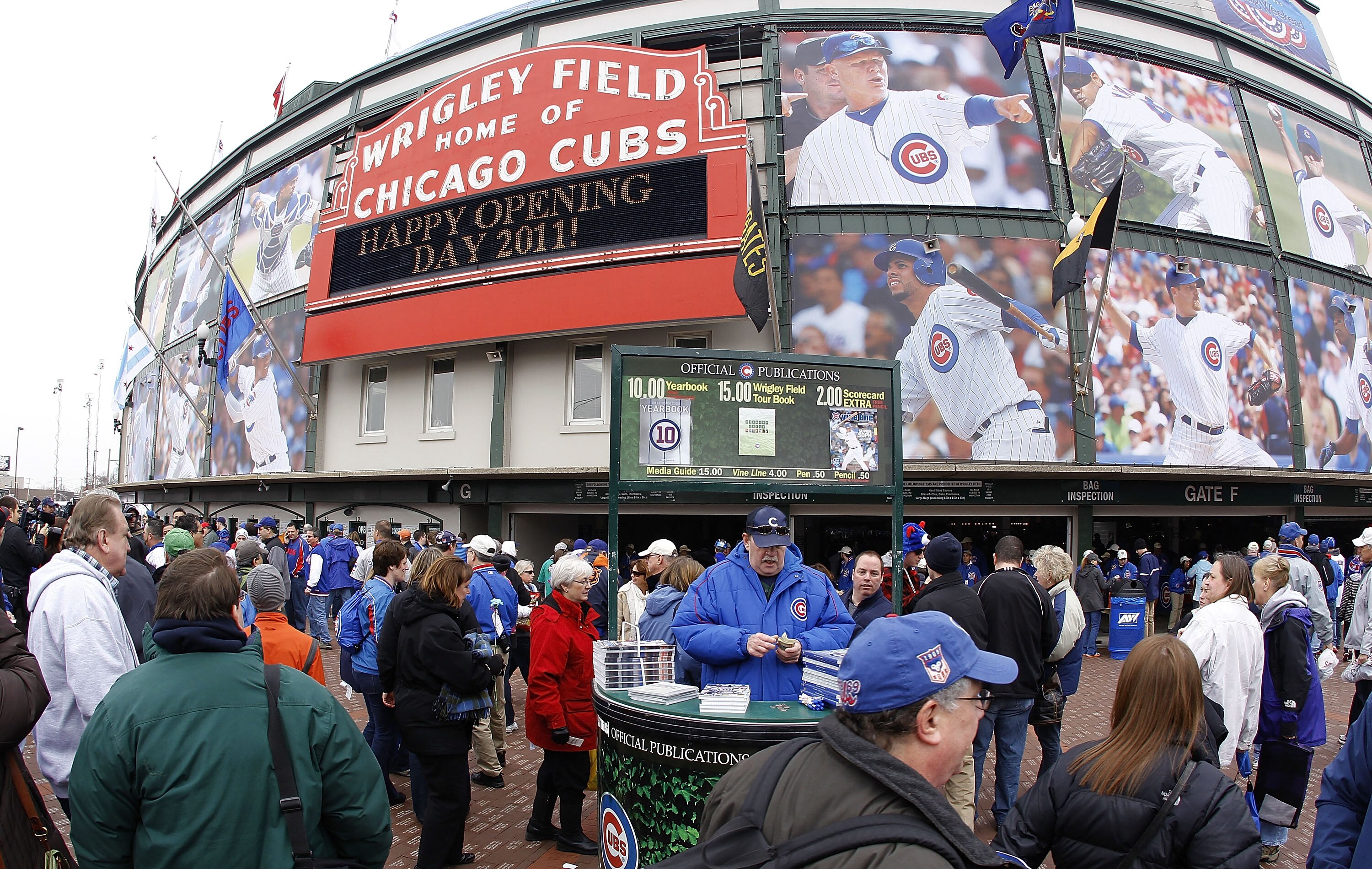 CHICAGO, IL - APRIL 01:  Fans head to the stadium prior to the Chicago Cubs playing the Pittsburgh Pirates on opening day at Wrigley Field on April 1, 2011 in Chicago, Illinois.  (Photo by Gregory Shamus/Getty Images)
