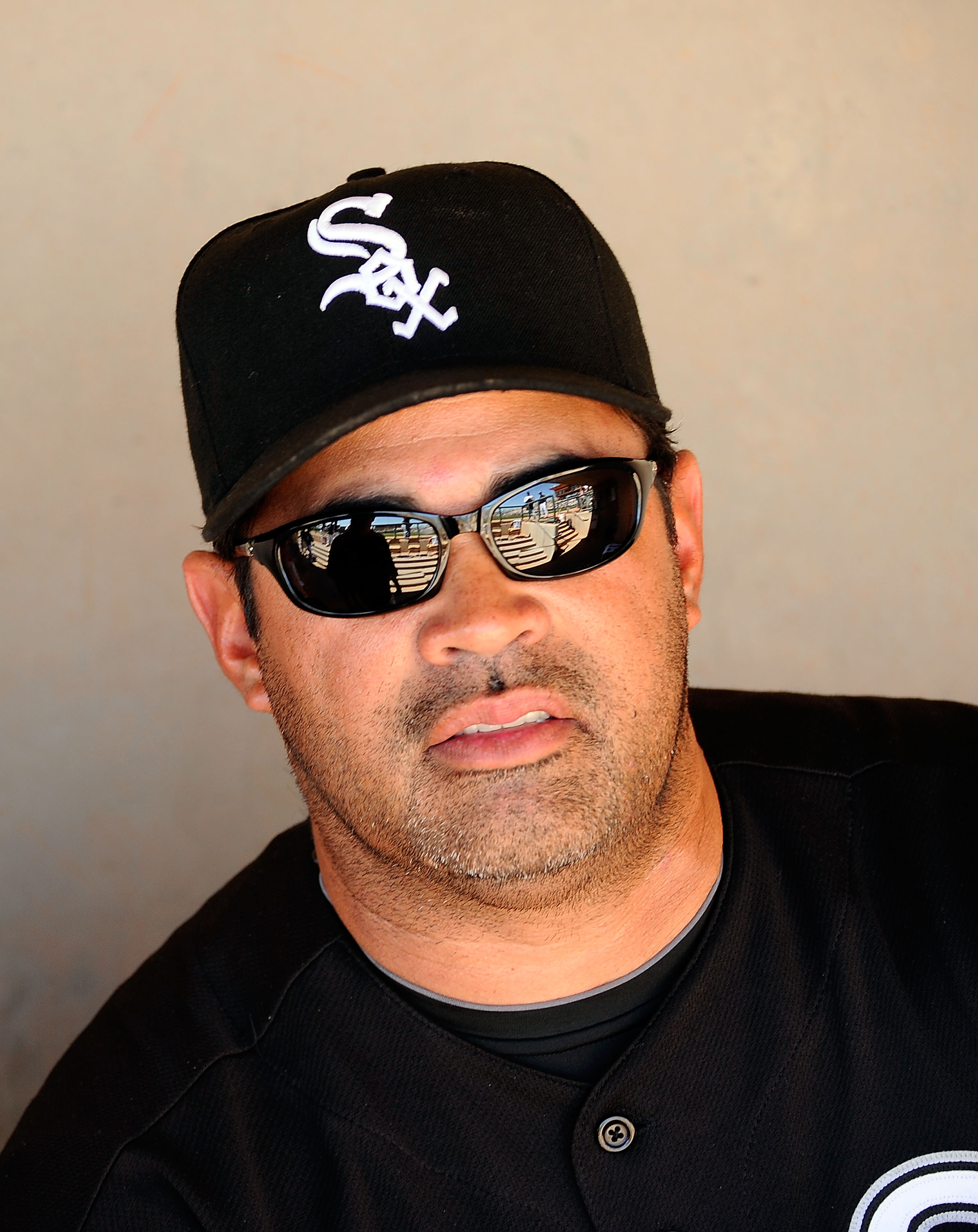 GLENDALE, AZ - MARCH 11:  Manager Ozzie Guillen #13 of the Chicago White Sox at the spring training baseball game against Chicago Cubs at Camelback Ranch on March 11, 2011 in Glendale, Arizona.  (Photo by Kevork Djansezian/Getty Images)
