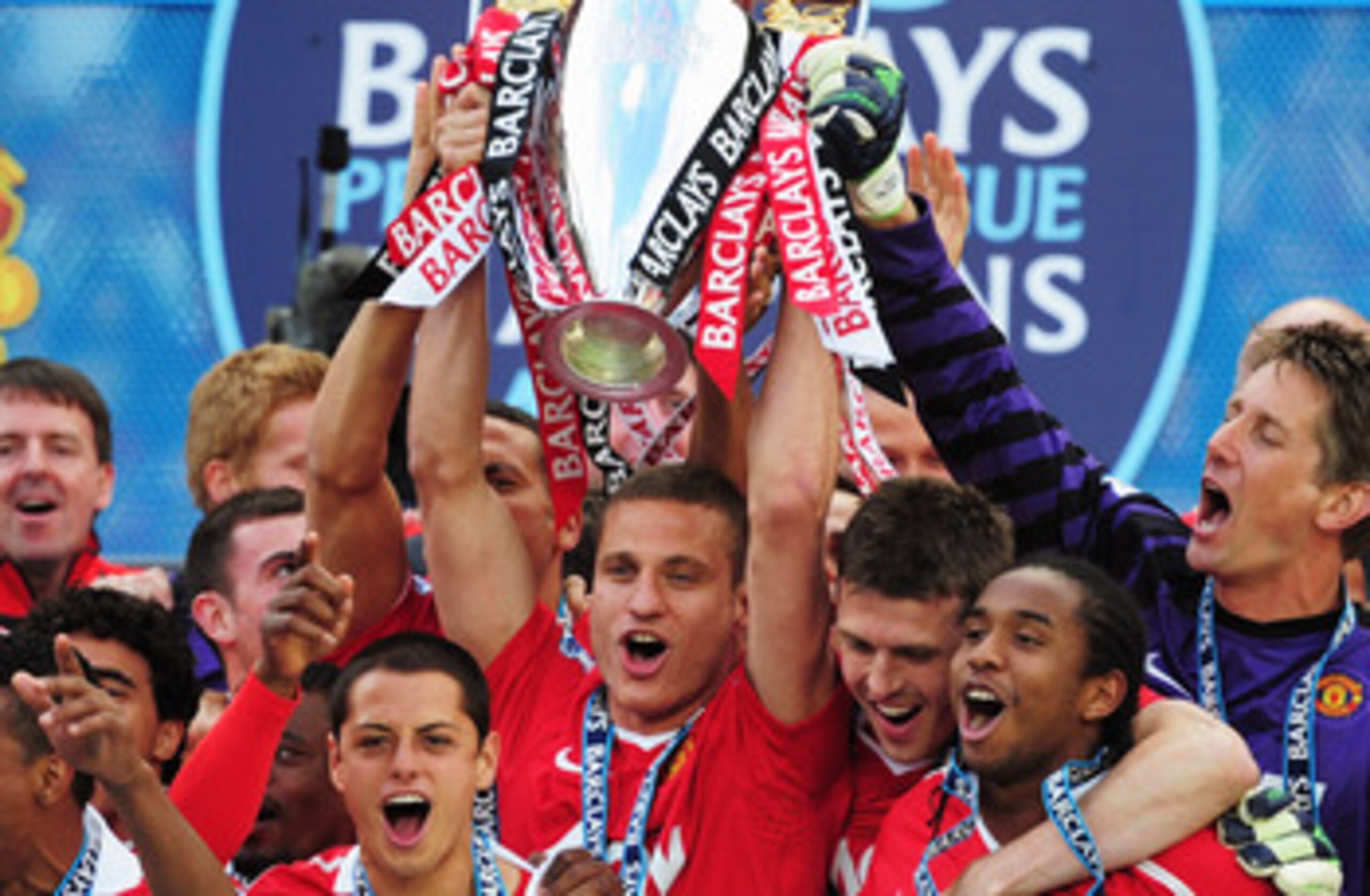 MANCHESTER, ENGLAND - MAY 22:  Captain Nemanja Vidic of Manchester United lifts the Premier League trophy after the Barclays Premier League match between Manchester United and Blackpool at Old Trafford on May 22, 2011 in Manchester, England. Manchester Un