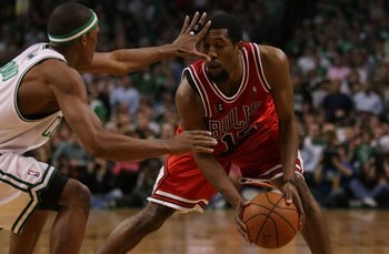 BOSTON - MAY 02:  John Salmons #15 of the Chicago Bulls tries to get around Rajon Rondo #9 of the Boston Celtics in Game Seven of the Eastern Conference Quarterfinals during the 2009 NBA Playoffs at TD Banknorth Garden on May 2, 2009 in Boston, Massachuse