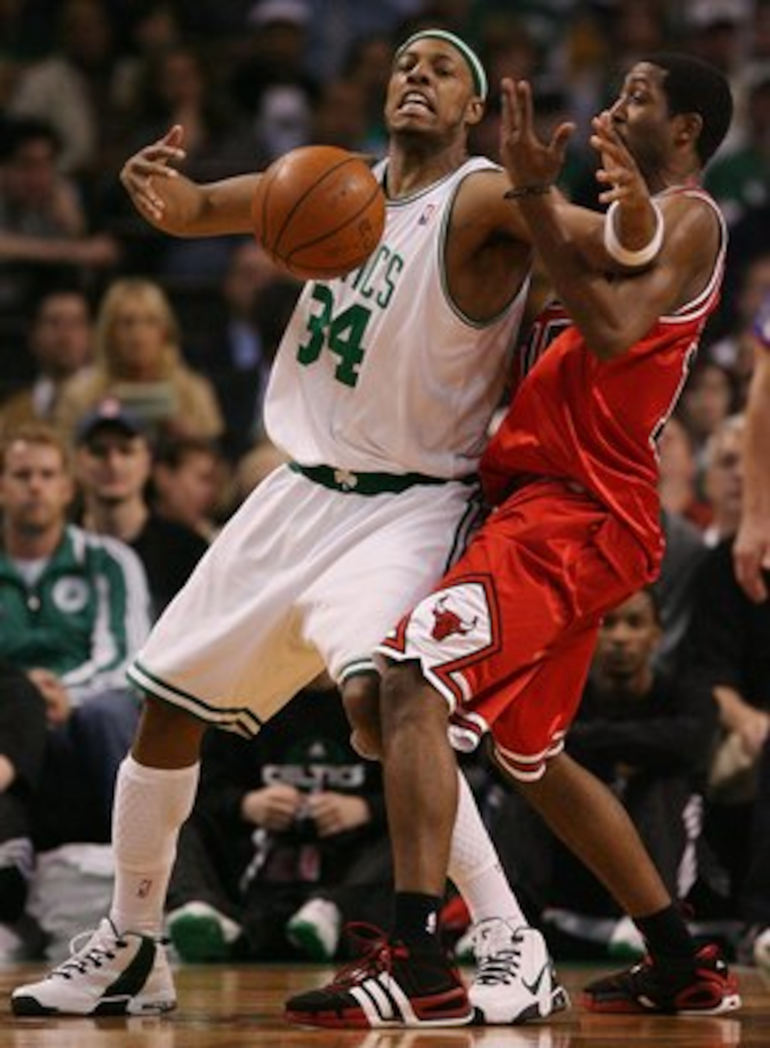 BOSTON - MAY 02:  Paul Pierce #34 of the Boston Celtics tries to hang on to the ball as John Salmons #15 of the Chicago Bulls defends in Game Seven of the Eastern Conference Quarterfinals during the 2009 NBA Playoffs at TD Banknorth Garden on May 2, 2009 