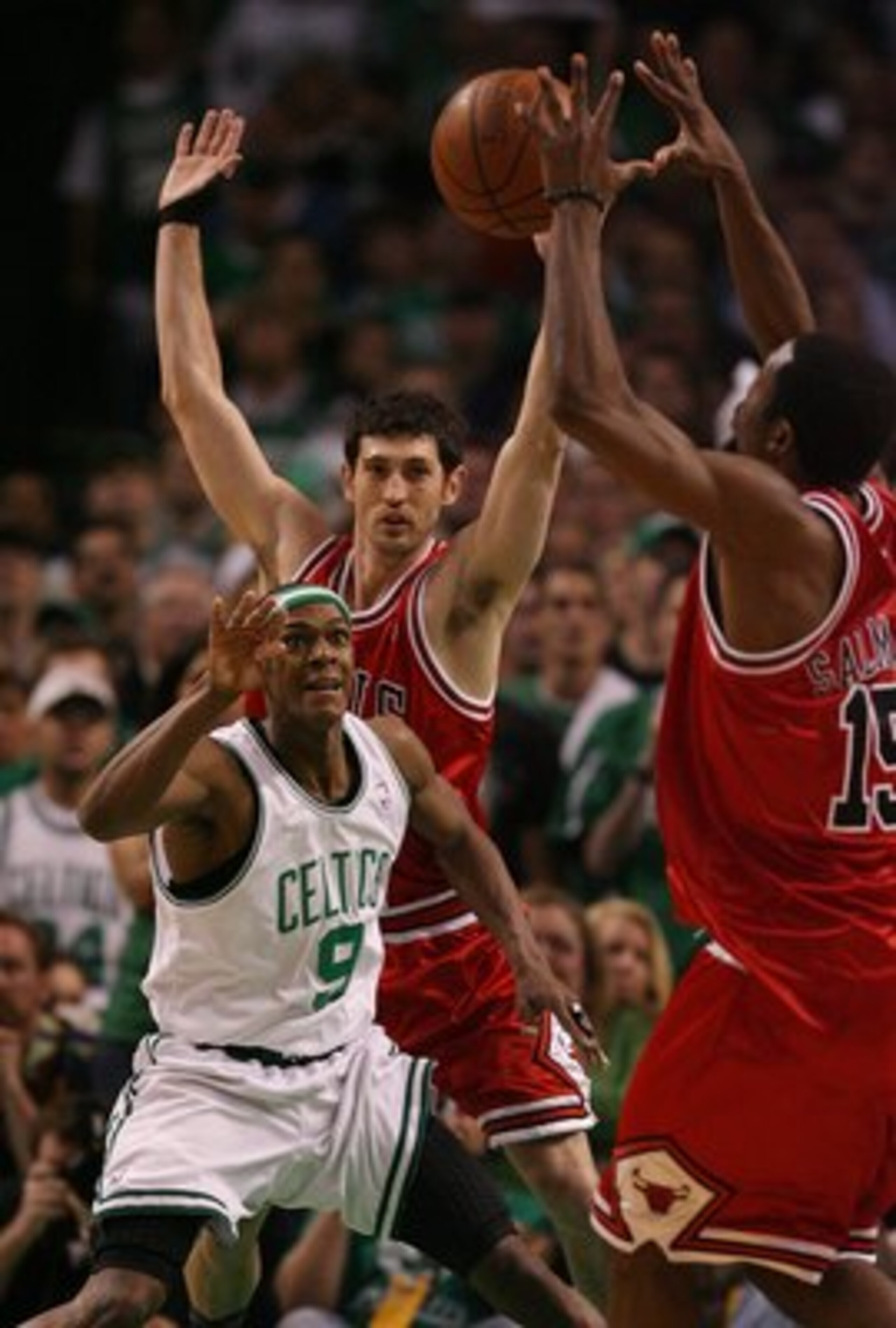 BOSTON - MAY 02:  Rajon Rondo #9 of the Boston Celtics loses the ball as Kirk Hinrich #12 of the Chicago Bulls defends in Game Seven of the Eastern Conference Quarterfinals during the 2009 NBA Playoffs at TD Banknorth Garden on May 2, 2009 in Boston, Mass