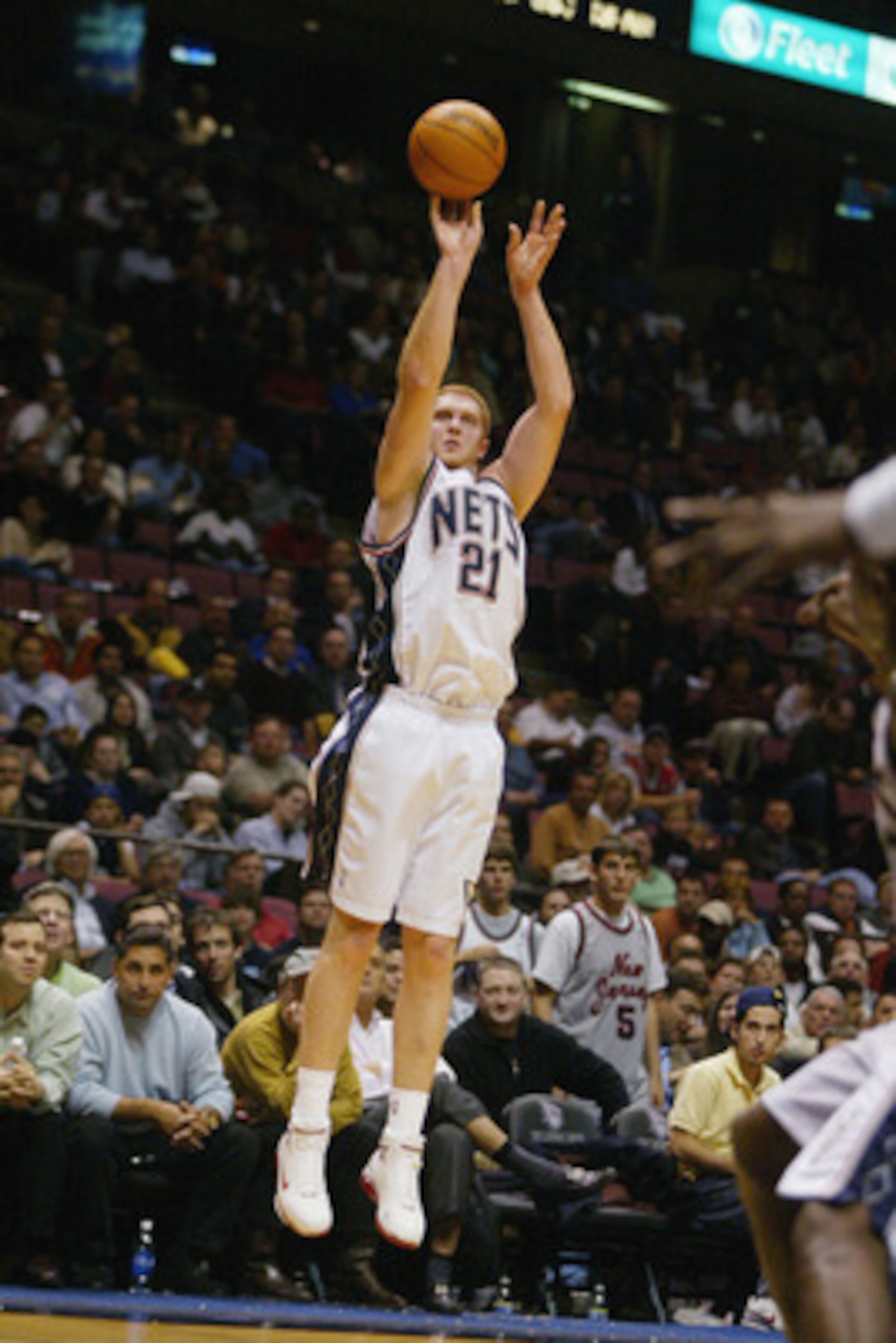 EAST RUTHERFORD, NJ - NOVEMBER 15:  Brian Scalabrine #21 of the New Jersey Nets shoots against the Houston Rockets during the game on November 15, 2004 at the Continental Airlines Arena in East Rutherford, New Jersey.  The Rockets won 80-69.  NOTE TO USER
