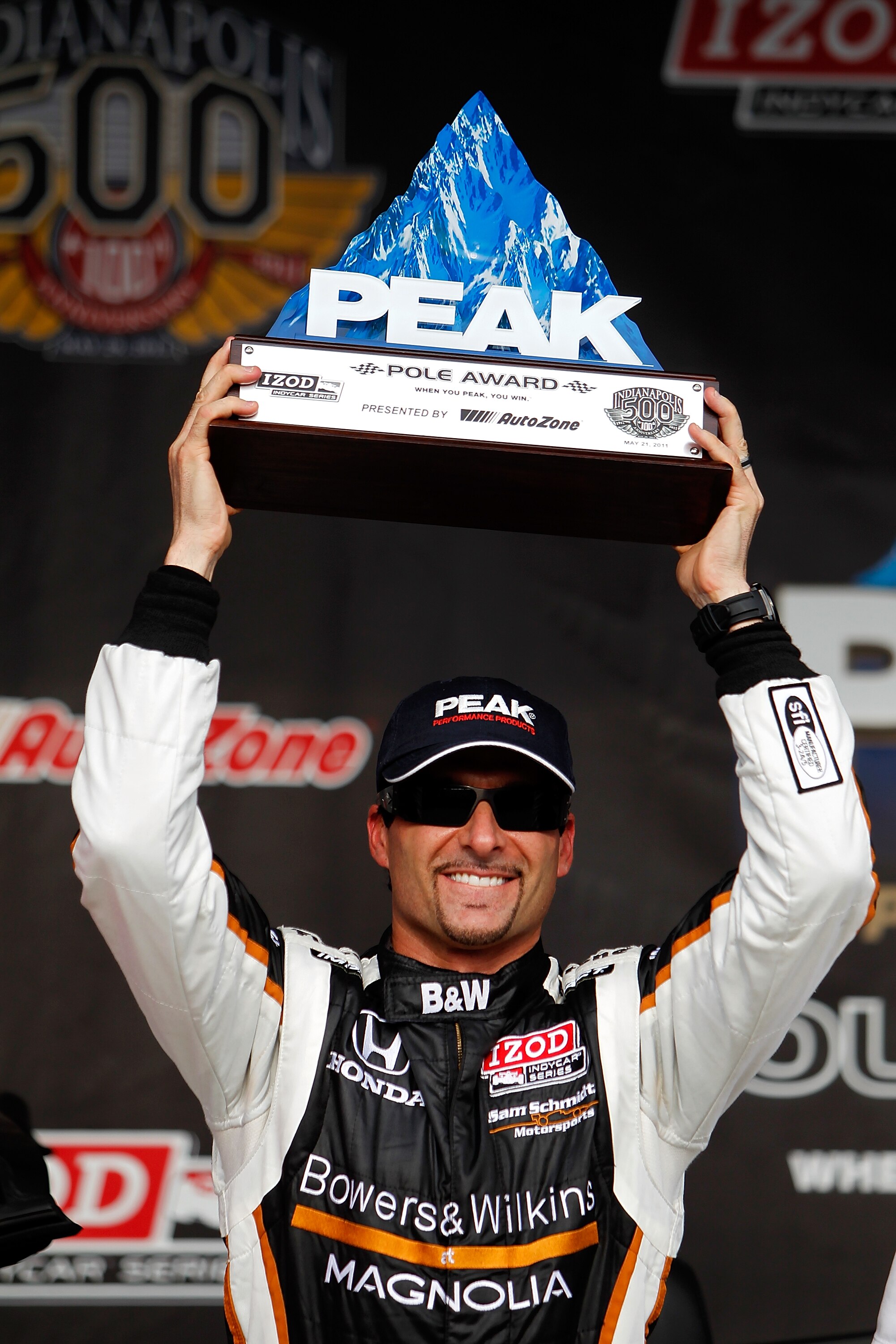 INDIANAPOLIS - MAY 21:  Alex Tagliani driver of the #77 Bowers & Wilkens/Sam Schmidt Motorsports Dallara Honda celebrates winning the pole position during qualifying for the the 95th Indianapolis 500 Mile Race at the Indianapolis Motor Speedway on May 21,