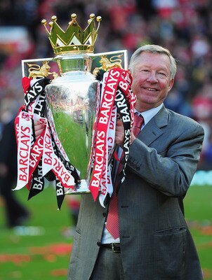 MANCHESTER, ENGLAND - MAY 22:  Sir Alex Ferguson manager of Manchester United lifts the Premier League trophy after the Barclays Premier League match between Manchester United and Blackpool at Old Trafford on May 22, 2011 in Manchester, England. Mancheste