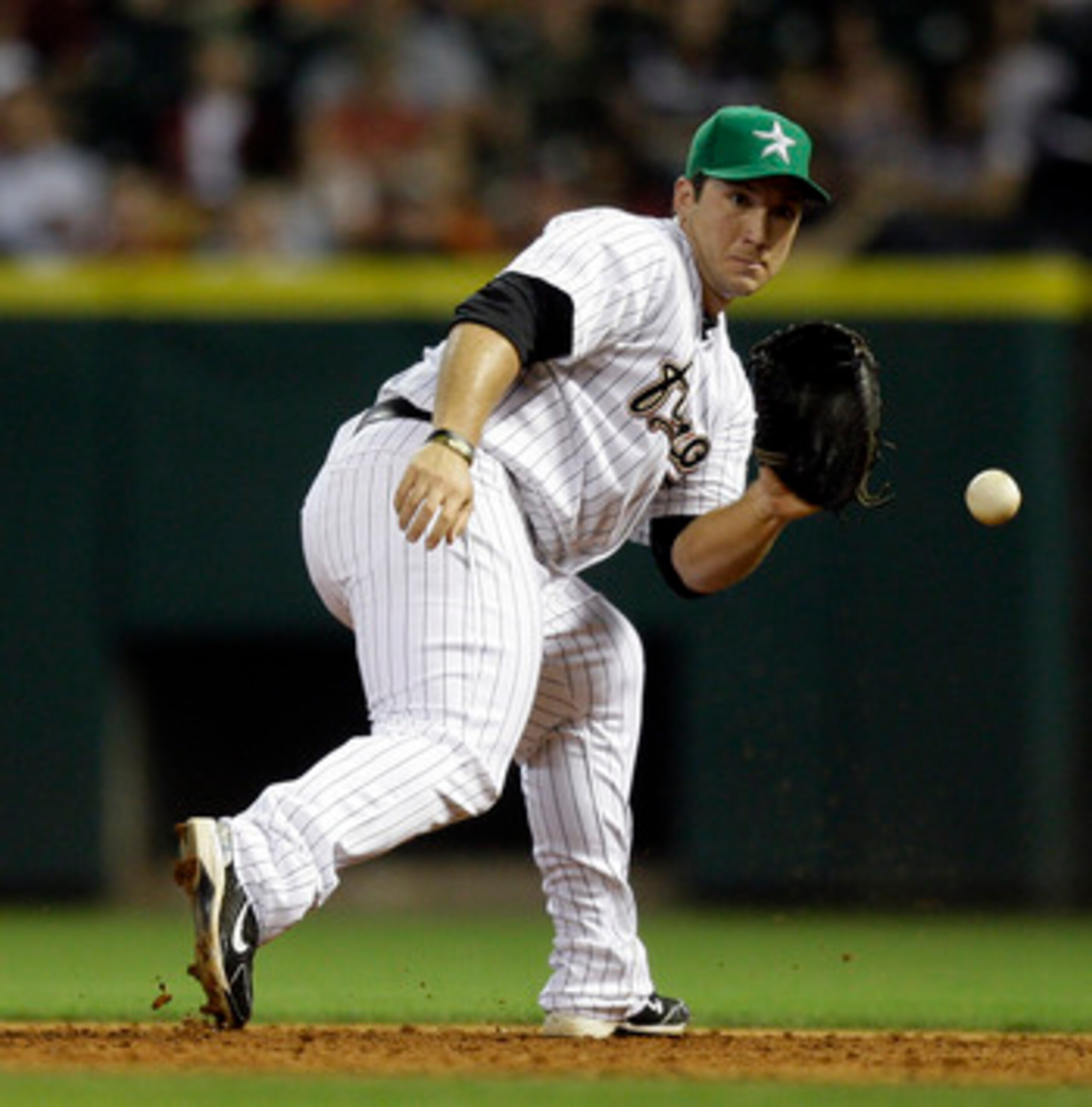 HOUSTON - APRIL 26:  First baseman Brett Wallace #29 of the Houston Astros fields a ground ball against the St. Louis Cardinals at Minute Maid Park on April 26, 2011 in Houston, Texas.  (Photo by Bob Levey/Getty Images)