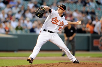BALTIMORE, MD - MAY 18:  Zach Britton #53 of the Baltimore Orioles pitches against the New York Yankees at Oriole Park at Camden Yards on May 18, 2011 in Baltimore, Maryland.  (Photo by Greg Fiume/Getty Images)