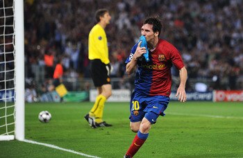 ROME - MAY 27:  Lionel Messi of Barcelona celebrates scoring the second goal for Barcelona during the UEFA Champions League Final match between Barcelona and Manchester United at the Stadio Olimpico on May 27, 2009 in Rome, Italy.  (Photo by Jasper Juinen
