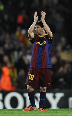 BARCELONA, SPAIN - MAY 03:  Lionel Messi of FC Barcelona celebrates after defeating Real Madrid at the end of the UEFA Champions League Semi Final second leg match between Barcelona and Real Madrid at the Camp Nou on May 3, 2011 in Barcelona, Spain.  (Pho