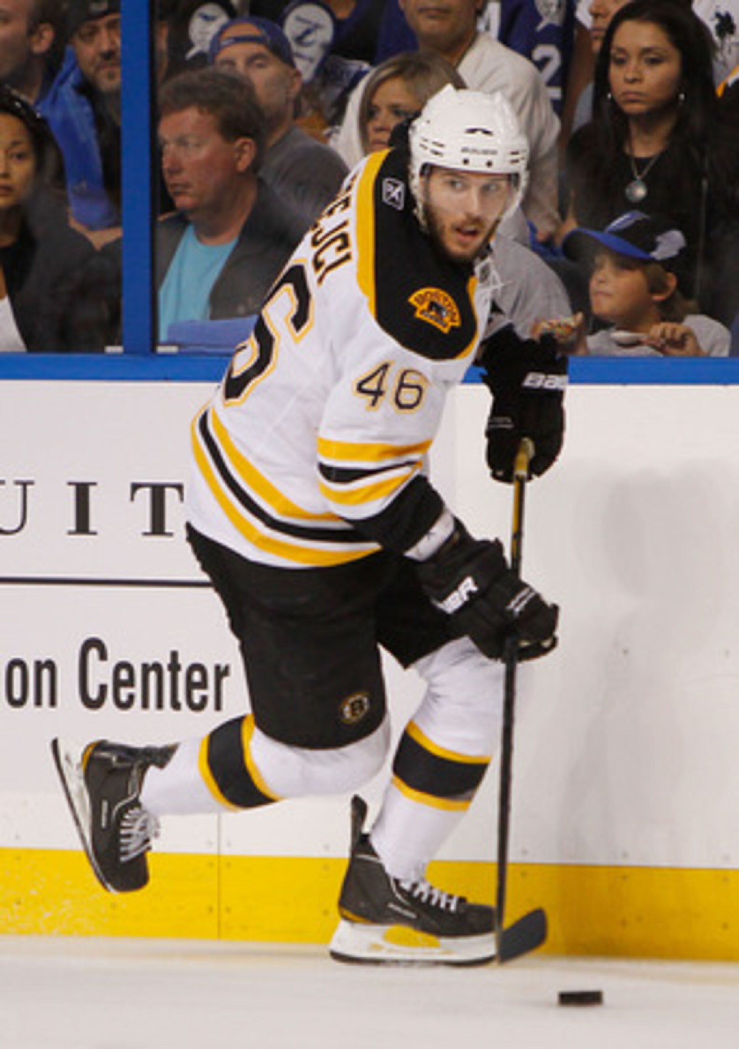 TAMPA, FL - MAY 19:  David Krejci #46 of the Boston Bruins controls the puck in Game Three of the Eastern Conference Finals against the Tampa Bay Lightning during the 2011 NHL Stanley Cup Playoffs at St Pete Times Forum on May 19, 2011 in Tampa, Florida.