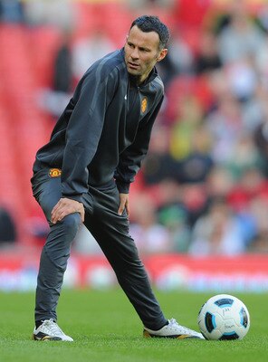 MANCHESTER, ENGLAND - MAY 24: Ryan Giggs of Manchester United warms up during the Gary Neville Testimonial Match between Manchester United and Juventus at Old Trafford on May 24, 2011 in Manchester, England.  (Photo by Michael Regan/Getty Images)