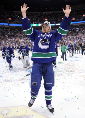 VANCOUVER, CANADA - MAY 24:  Henrik Sedin #33 of the Vancouver Canucks celebrates after defeating the San Jose Sharks 3-2 in double-overtime in Game Five to win the Western Conference Finals during the 2011 Stanley Cup Playoffs at Rogers Arena on May 24,