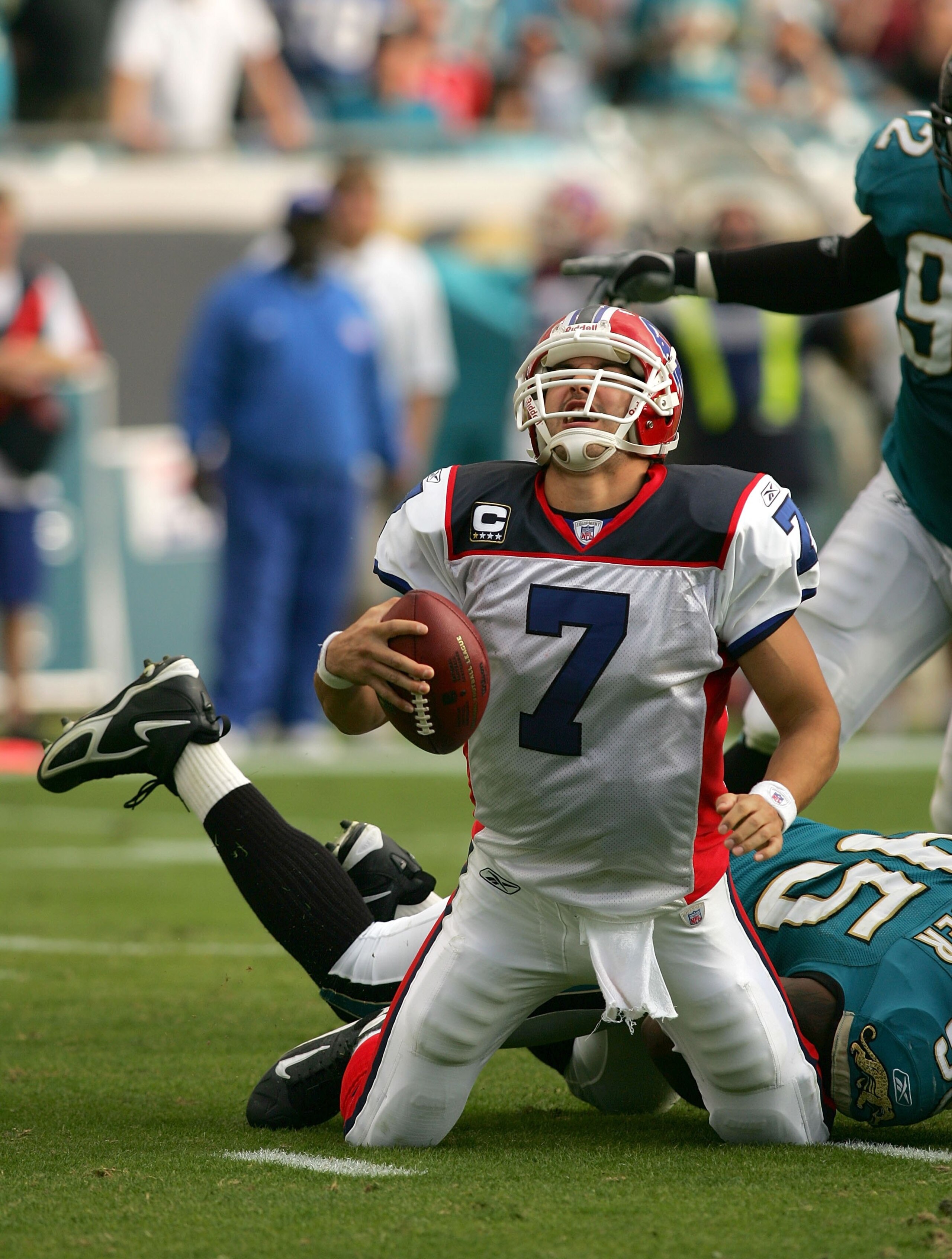 JACKSONVILLE, FL - NOVEMBER 25: JP Losman #7 of the Buffalo Bills is tackled in a game against the Jacksonville Jaguars at Jacksonville Municipal Stadium in Jacksonville, Florida on November 25, 2007.  The Jaguars beat the Bills 36-14.  (Photo by Sam Gree