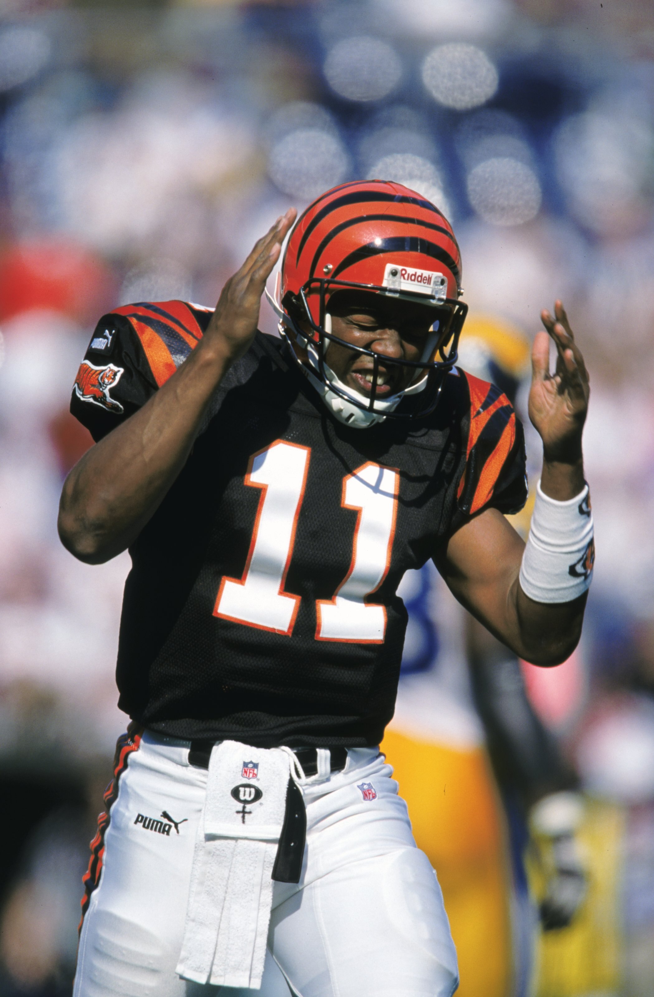 3 Oct 1999: Akili Smith #11 of the Cincinnati Bengals reacts to the pass during a game against the St. Louis Rams at the Riverfront Stadium in Cincinnati, Ohio. The Rams defeated the Bengals 38-10. Mandatory Credit: Andy Lyons  /Allsport