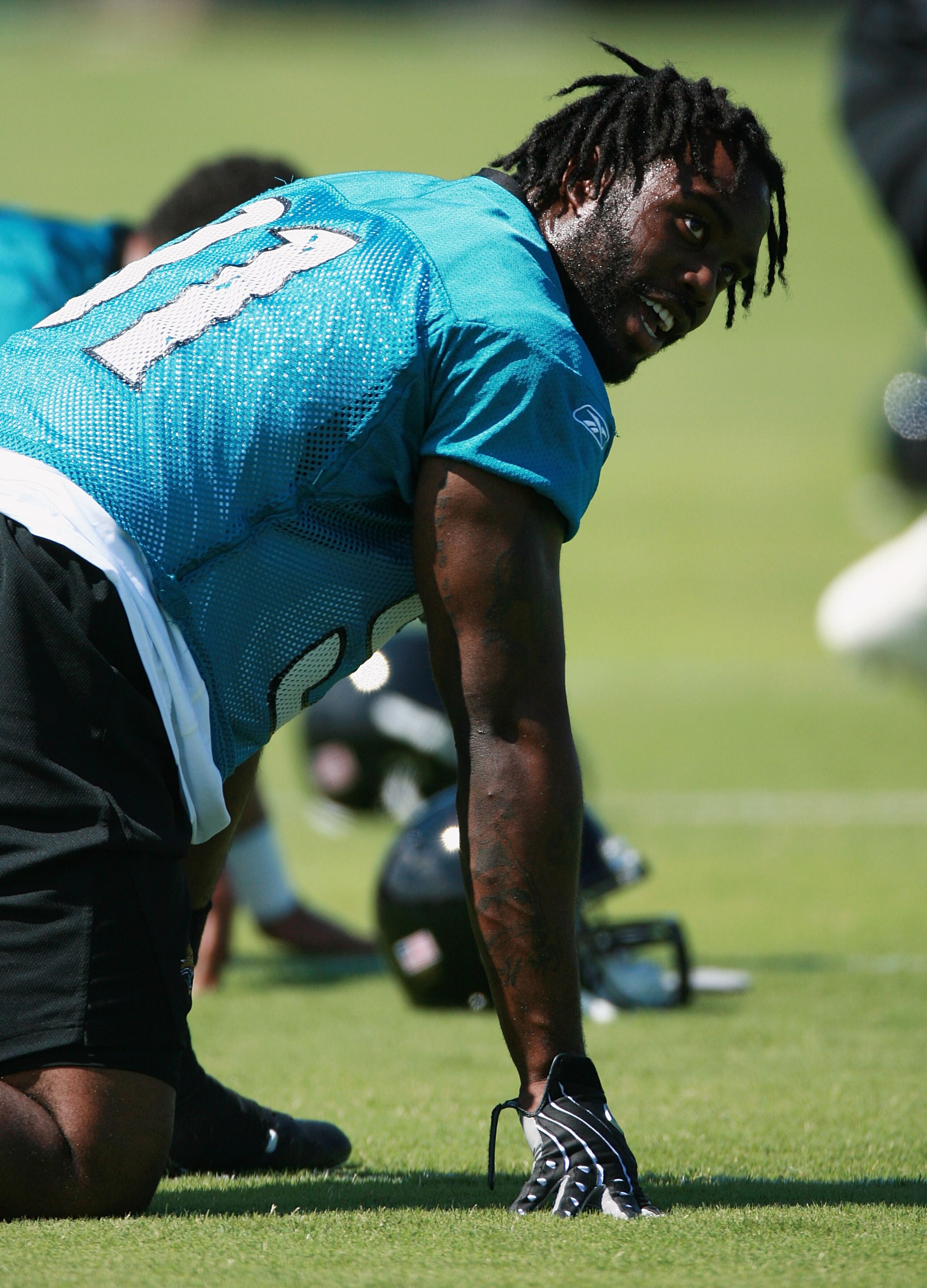JACKSONVILLE, FL - JUNE 06: Defensive end Derrick Harvey #91 of the Jacksonville Jaguars stretches during mini camp Jacksonville Municipal Stadium on June 6, 2008 in Jacksonville, Florida. (Photo by Doug Benc/Getty Images)