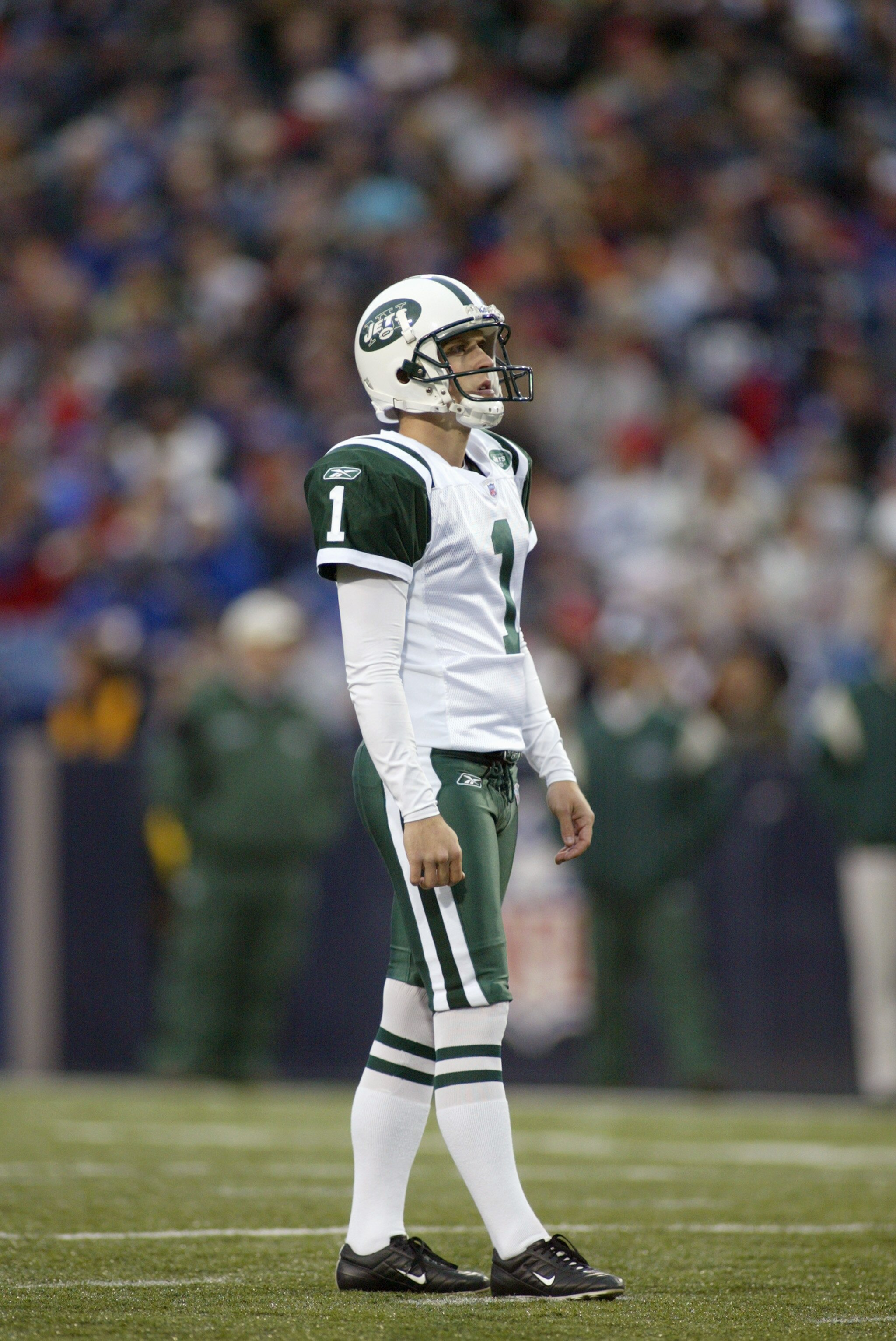 ORCHARD PARK, NY - OCTOBER 16: Kicker Mike Nugent #1 of the New York Jets watches the ball during the game against the Buffalo Bills on October 16, 2005 at Ralph Wilson Stadium in Orchard Park, New York. The Bills won 27-17. (Photo by Rick Stewart/Getty I