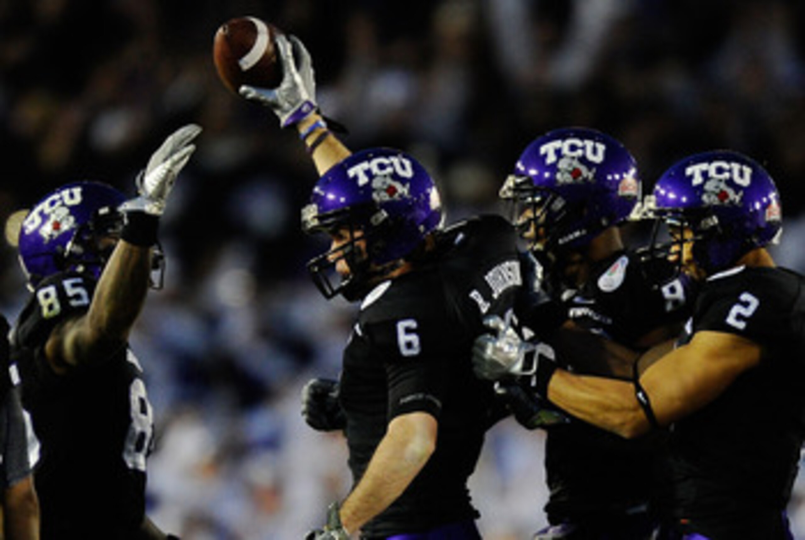 PASADENA, CA - JANUARY 01:  Wide receiver Bart Johnson #6 of the TCU Horned Frogs celebrates recovering an onside kick attempt by the Wisconsin Badgers in the 97th Rose Bowl game on January 1, 2011 in Pasadena, California.  (Photo by Kevork Djansezian/Get