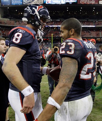 HOUSTON - JANUARY 02:  Quarterback Matt Schaub #8 of the Houston Texans hands running back Arian Foster #23 the game ball after Houston defeated the Jacksonville Jaguars 34-17 at Reliant Stadium on January 2, 2011 in Houston, Texas.  (Photo by Bob Levey/G