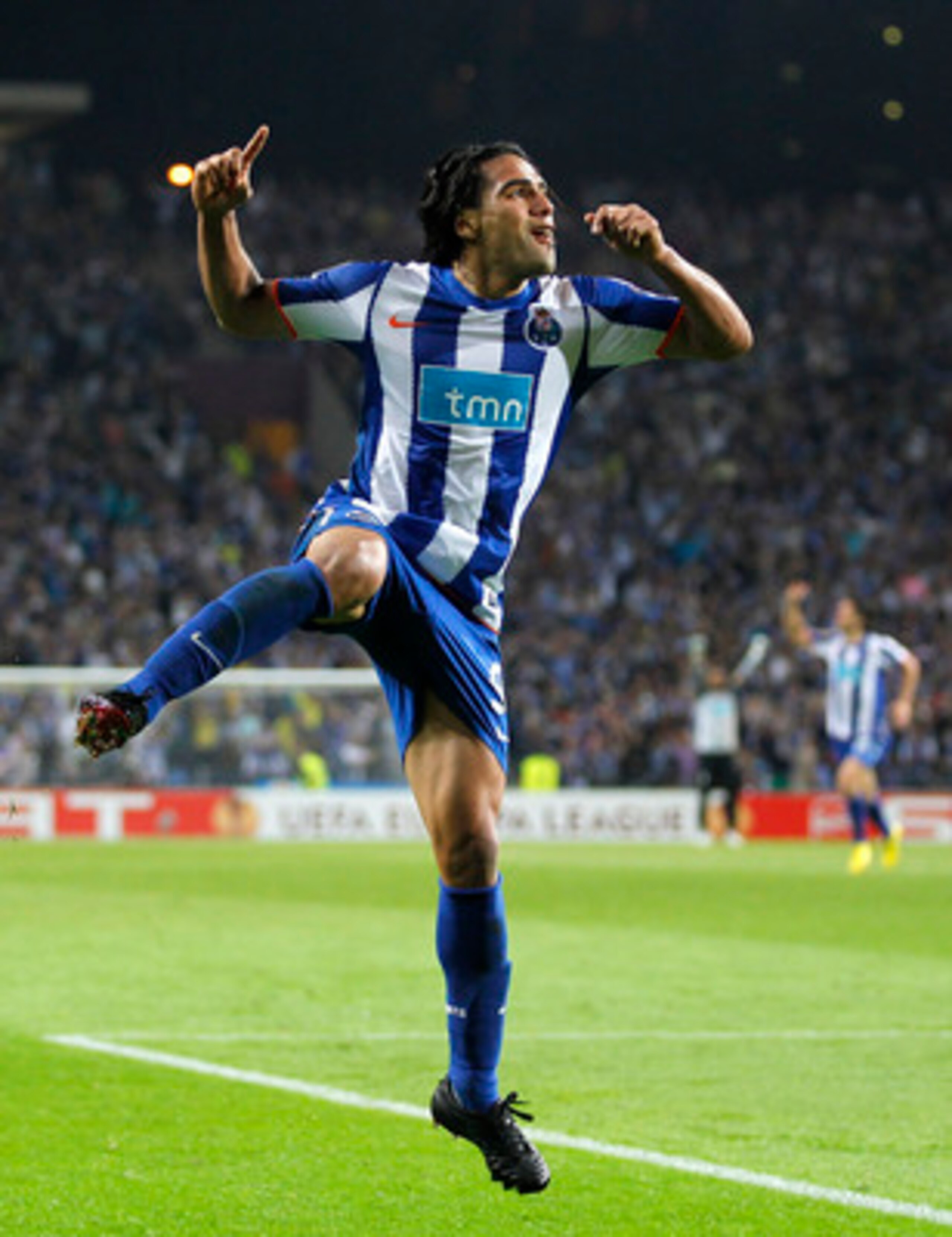 PORTO, PORTUGAL - APRIL 28: Radamel Falcao of FC Porto celebrates after scoring his side fifth goal during the UEFA Europa League semi final first leg match between FC Porto and Villarreal at Estadio do Dragao on April 28, 2011 in Porto, Portugal. (Phot PORTO, PORTUGAL - APRIL 28: Radamel Falcao of FC Porto celebrates after scoring his side fifth goal during the UEFA Europa League semi final first leg match between FC Porto and Villarreal at Estadio do Dragao on April 28, 2011 in Porto, Portugal. (Phot