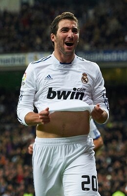 MADRID, SPAIN - NOVEMBER 20:  Gonzalo Higuain of Real Madrid celebrates after scoring the 1-0 during the La Liga match between Real Madrid and Athletic Bilbao at Estadio Santiago Bernabeu on November 20, 2010 in Madrid, Spain. Real Madrid won 5-1. (Photo 