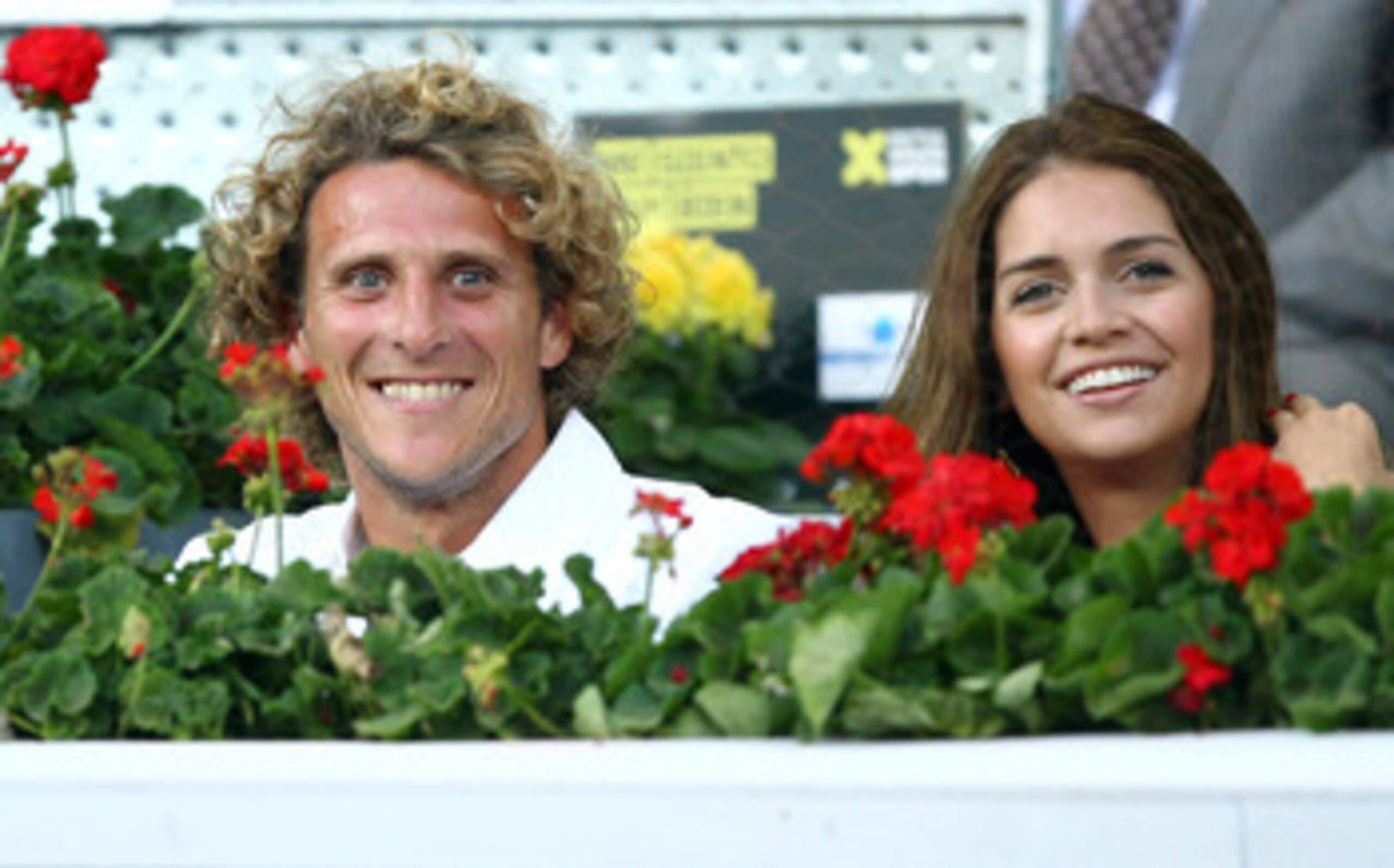 MADRID, SPAIN - MAY 05: Diego Forlan of Athletico Madrid with girlfriend Zaira Nara watch on during day six of the Mutua Madrilena Madrid Open Tennis on May 5, 2011 in Madrid, Spain. (Photo by Julian Finney/Getty Images) MADRID, SPAIN - MAY 05: Diego Forlan of Athletico Madrid with girlfriend Zaira Nara watch on during day six of the Mutua Madrilena Madrid Open Tennis on May 5, 2011 in Madrid, Spain. (Photo by Julian Finney/Getty Images)