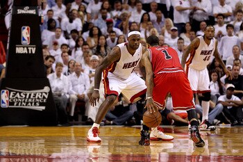 MIAMI, FL - MAY 24:  LeBron James #6 of the Miami Heat defends Derrick Rose #1 of the Chicago Bulls in Game Four of the Eastern Conference Finals during the 2011 NBA Playoffs on May 24, 2011 at American Airlines Arena in Miami, Florida. The Heat won 101-9
